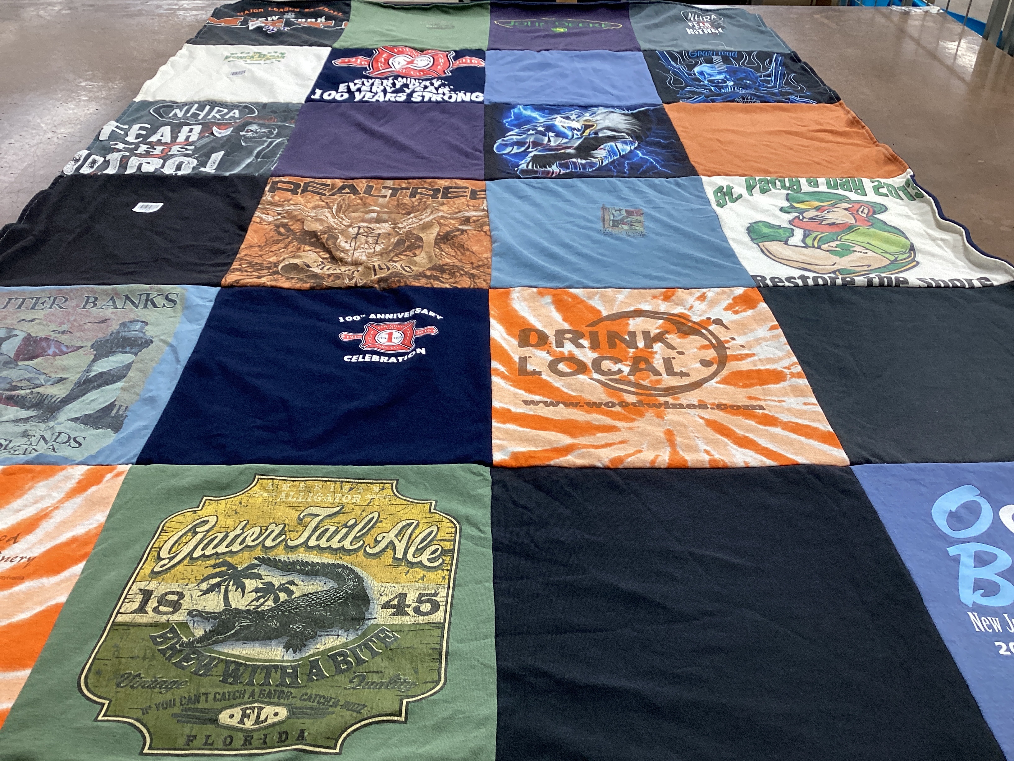 T-shirt quilt with brewing, outdoor activities themes by Linda from NJ