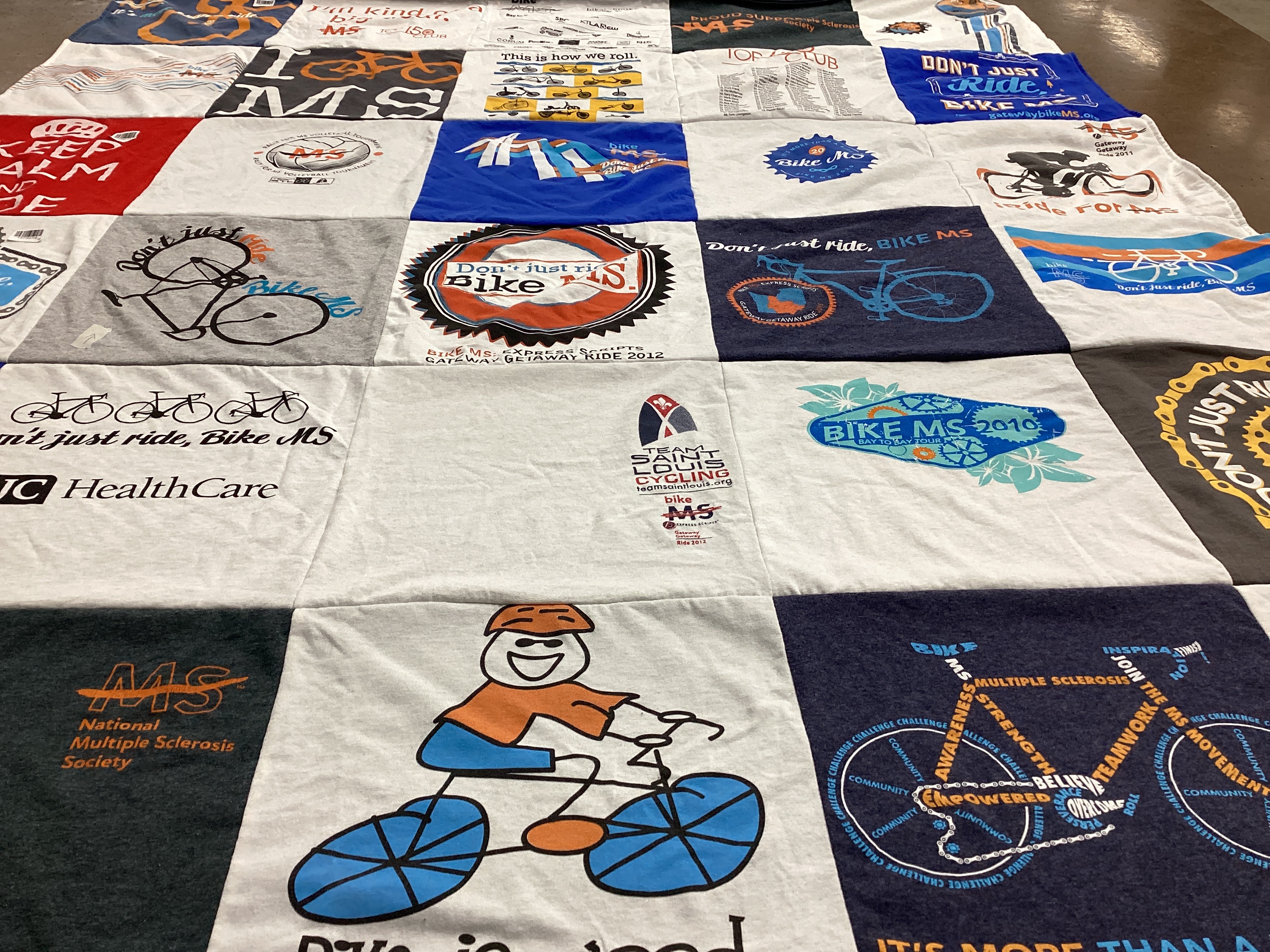 T-shirt quilt with cycling, biking themes by Alice from IL