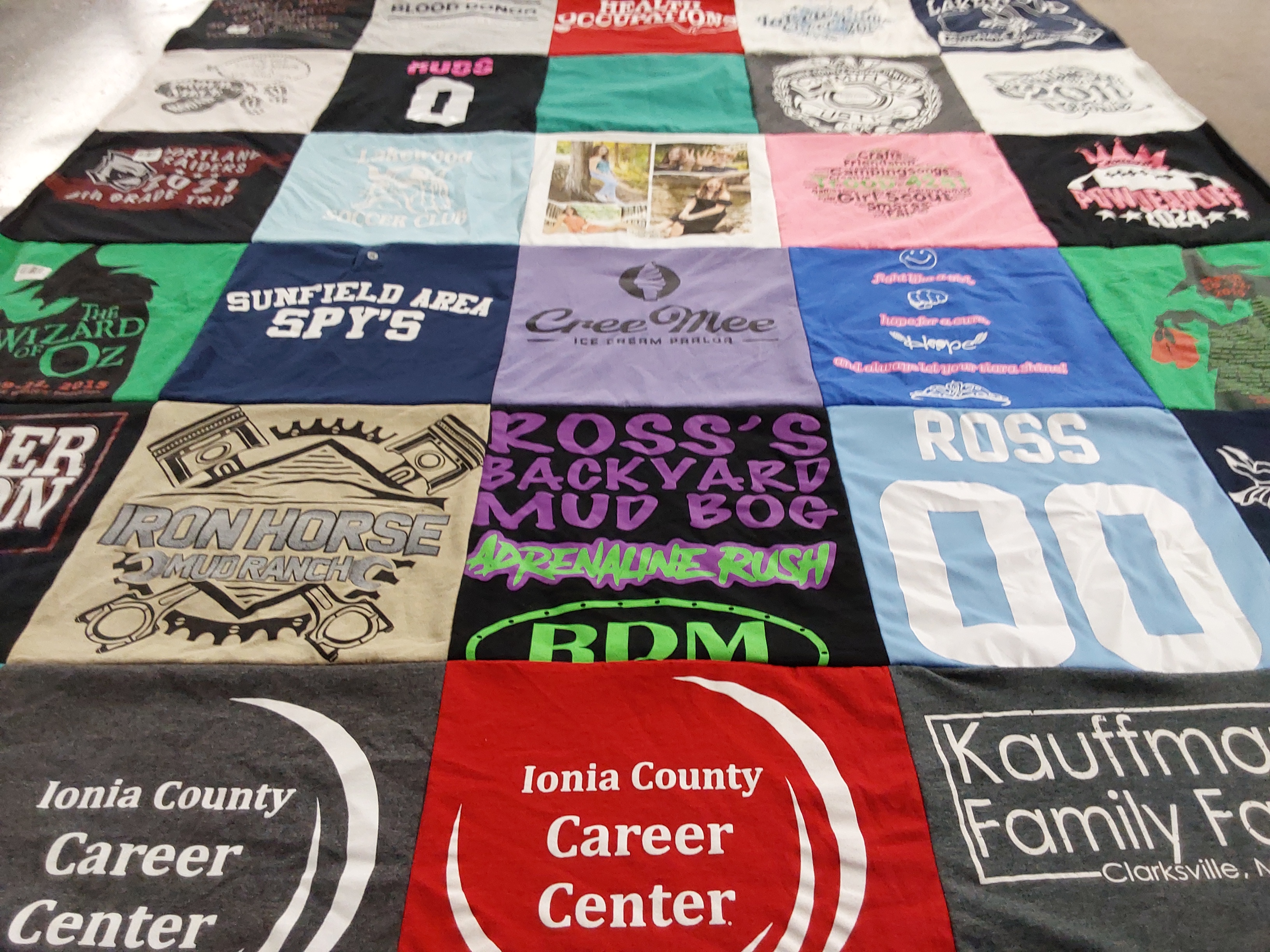 T-shirt quilt with mud running, ice cream themes by Amber from MI