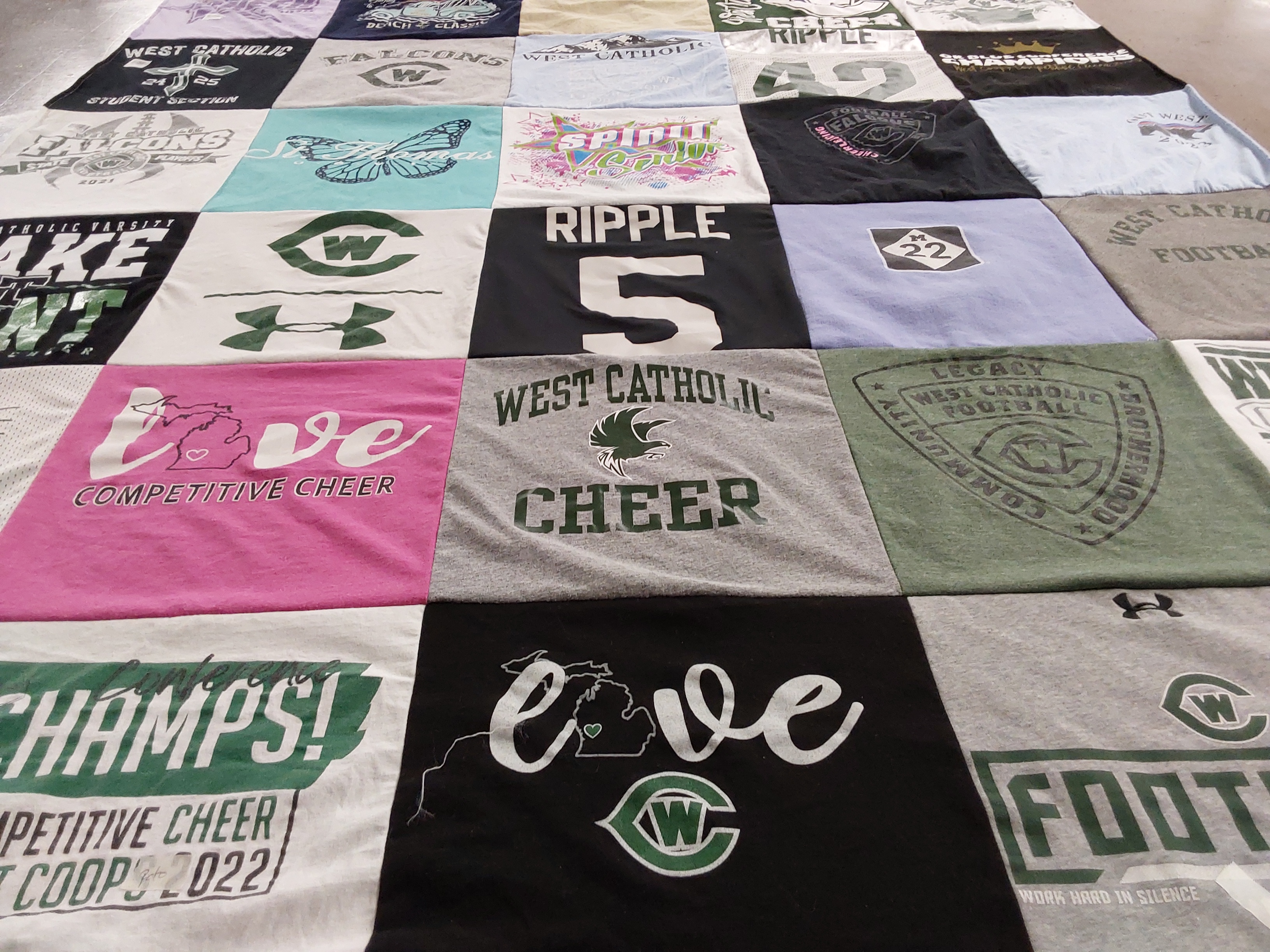 T-shirt quilt featuring west catholic high school football, west catholic high school cheer by Corinne from MI