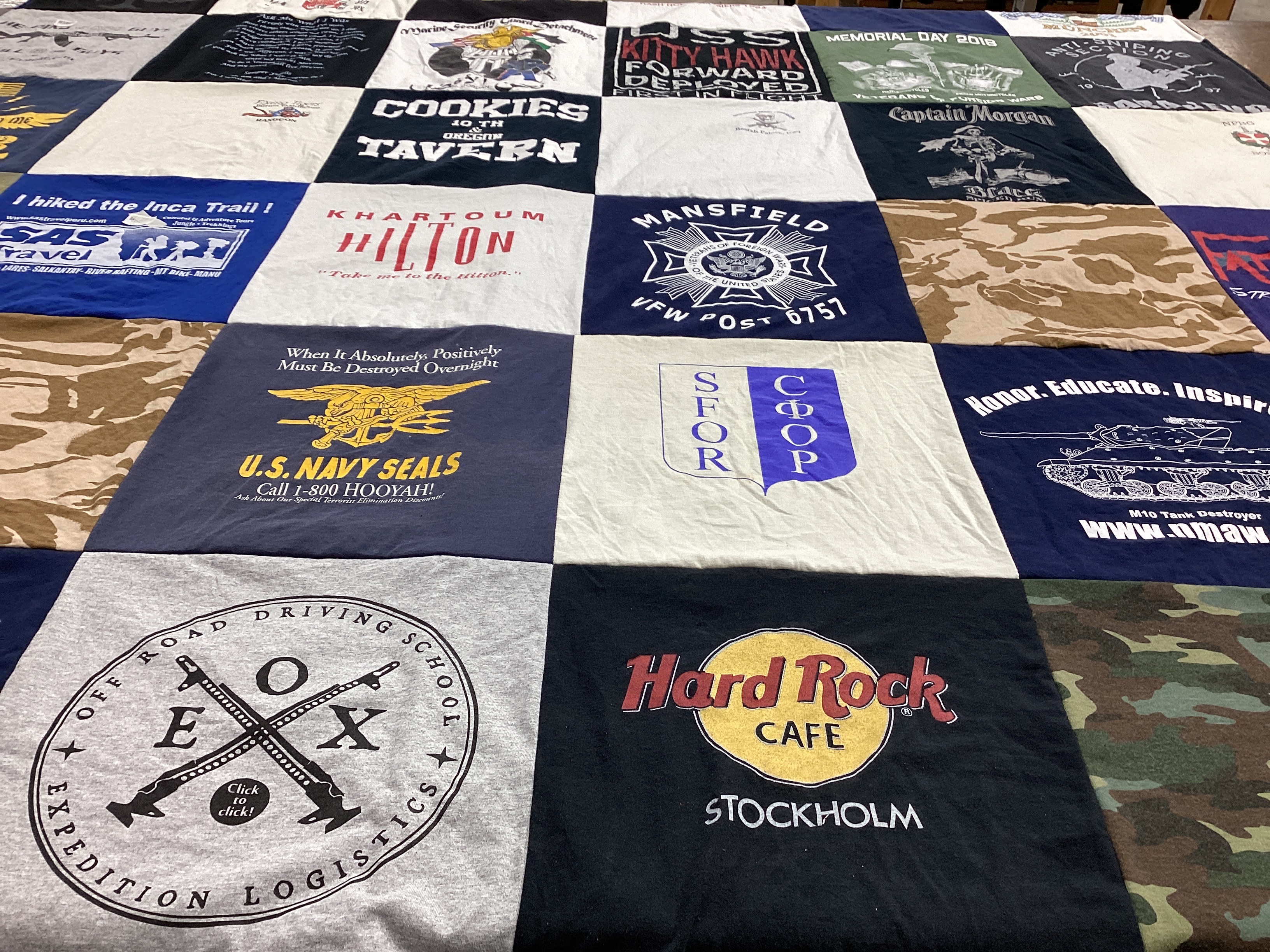 T-shirt quilt with travel, military themes by Erik from PA