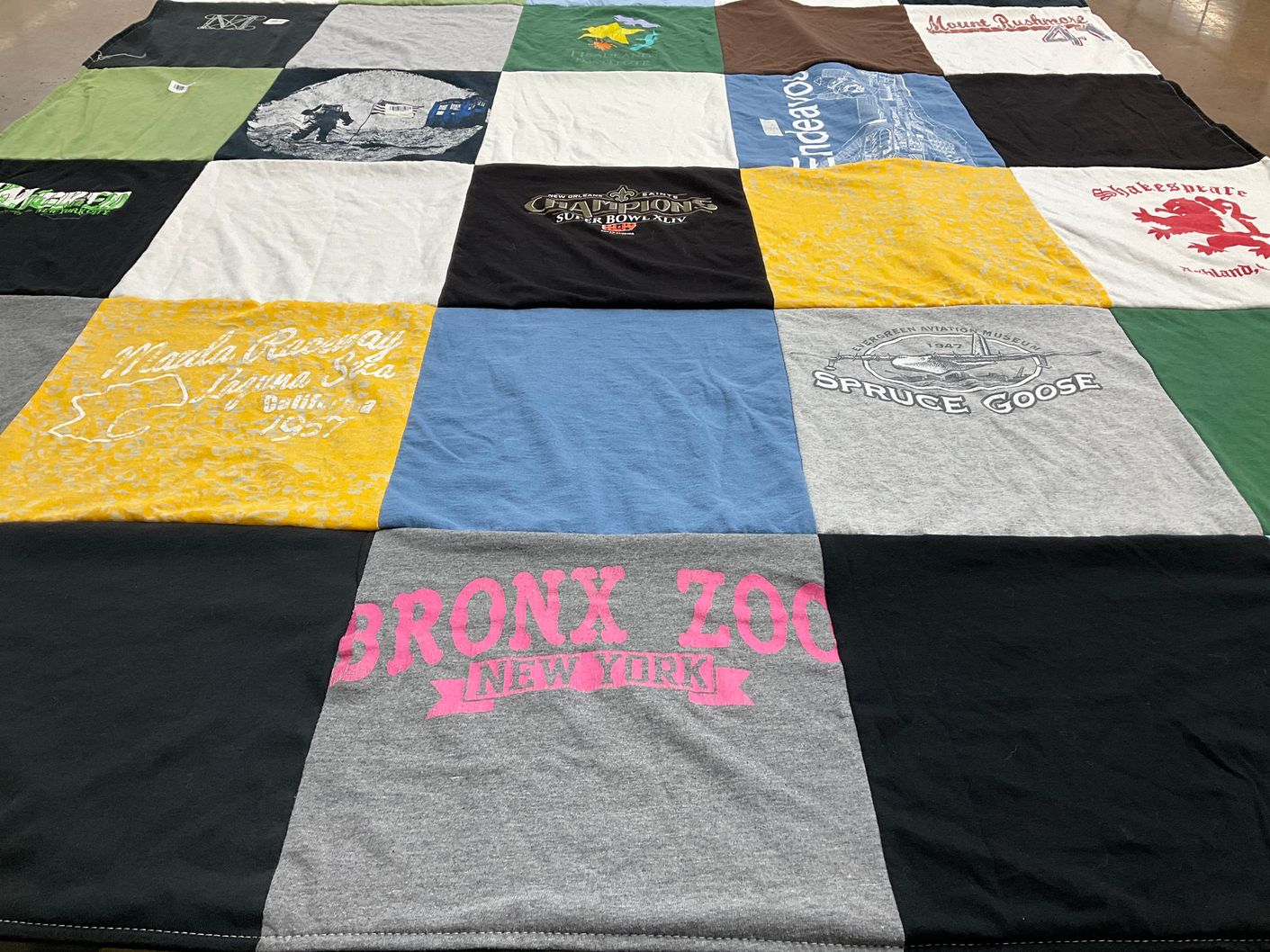 T-shirt quilt with travel, zoos themes by Natallia from CA