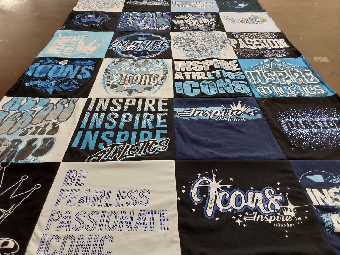 T-shirt quilt with sports, athletics themes by Emily from NC