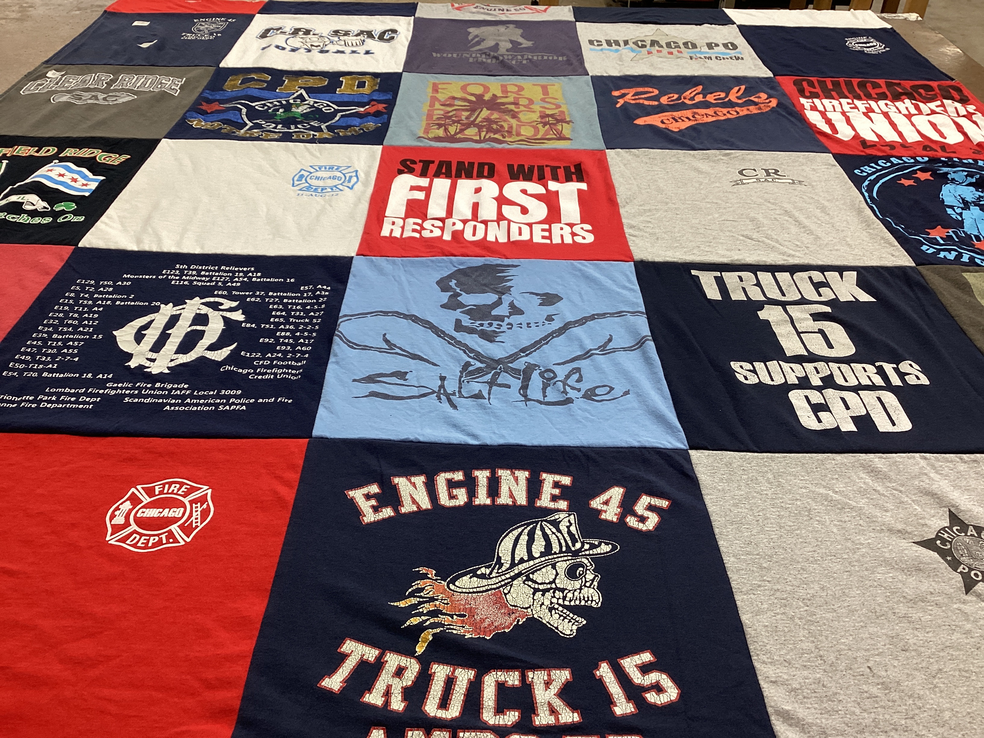 T-shirt quilt with firefighting, emergency services themes by Jen from IL