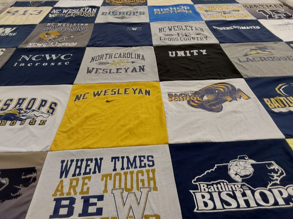 T-shirt quilt featuring battling bishops by Deja from GA
