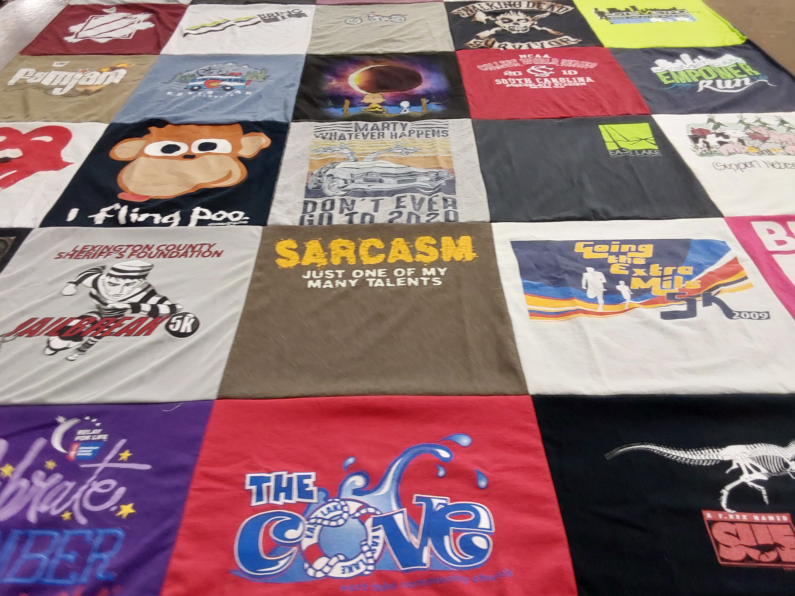 T-shirt quilt with running, humor themes by Susan from SC
