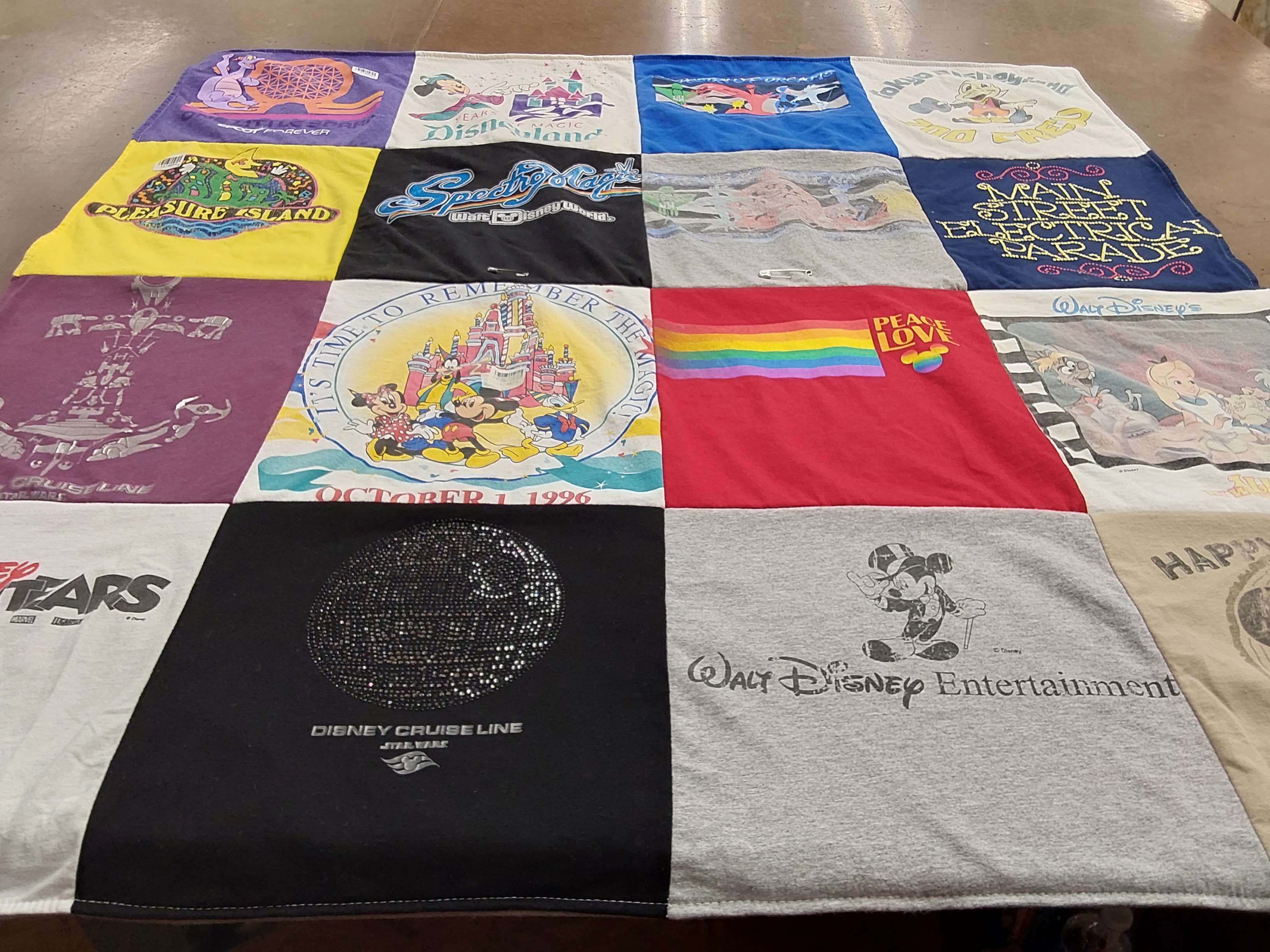 T-shirt quilt with disney, cruises themes by Andrea from FL