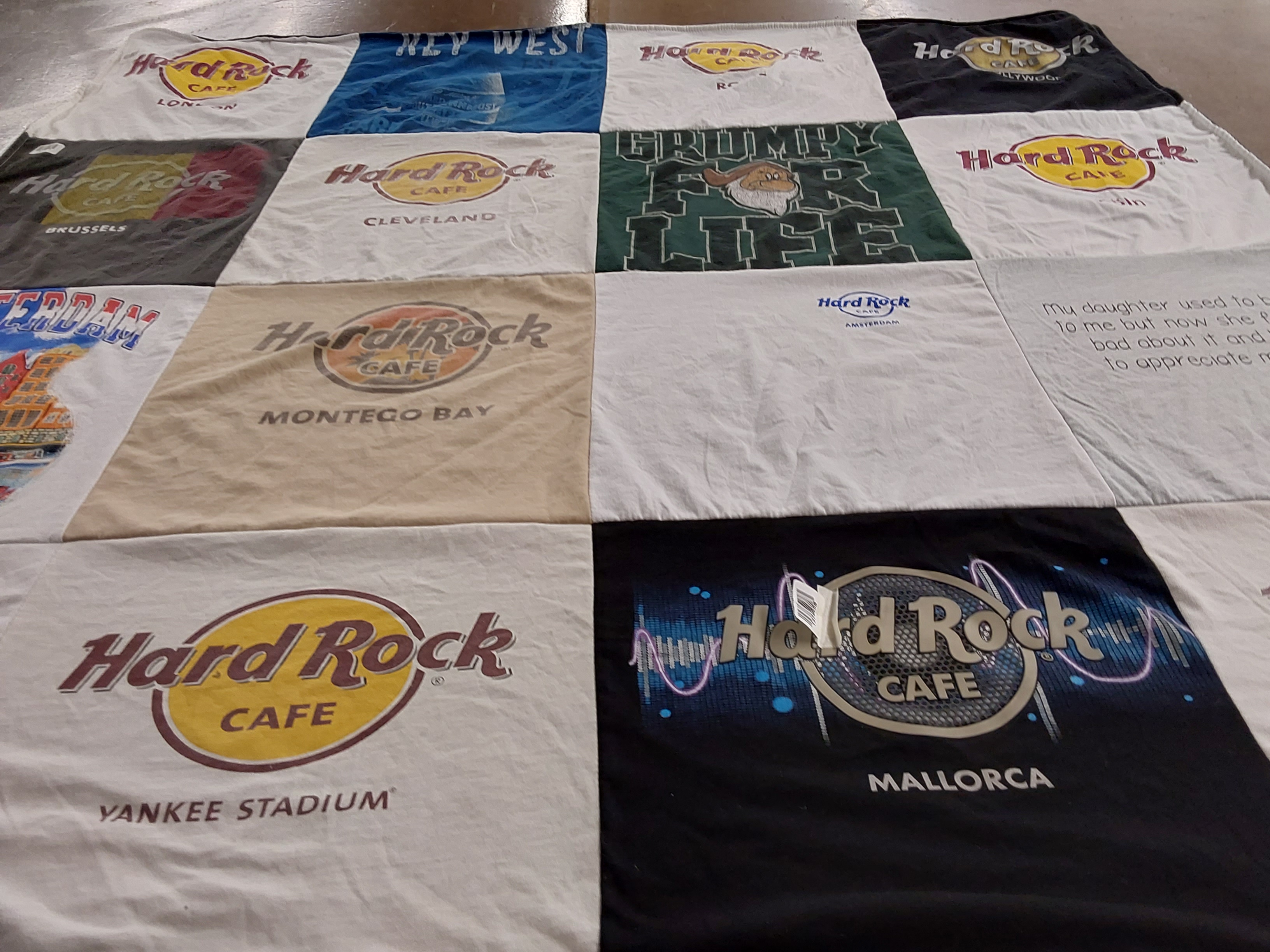 T-shirt quilt with music, traveling themes by Joanne from NY