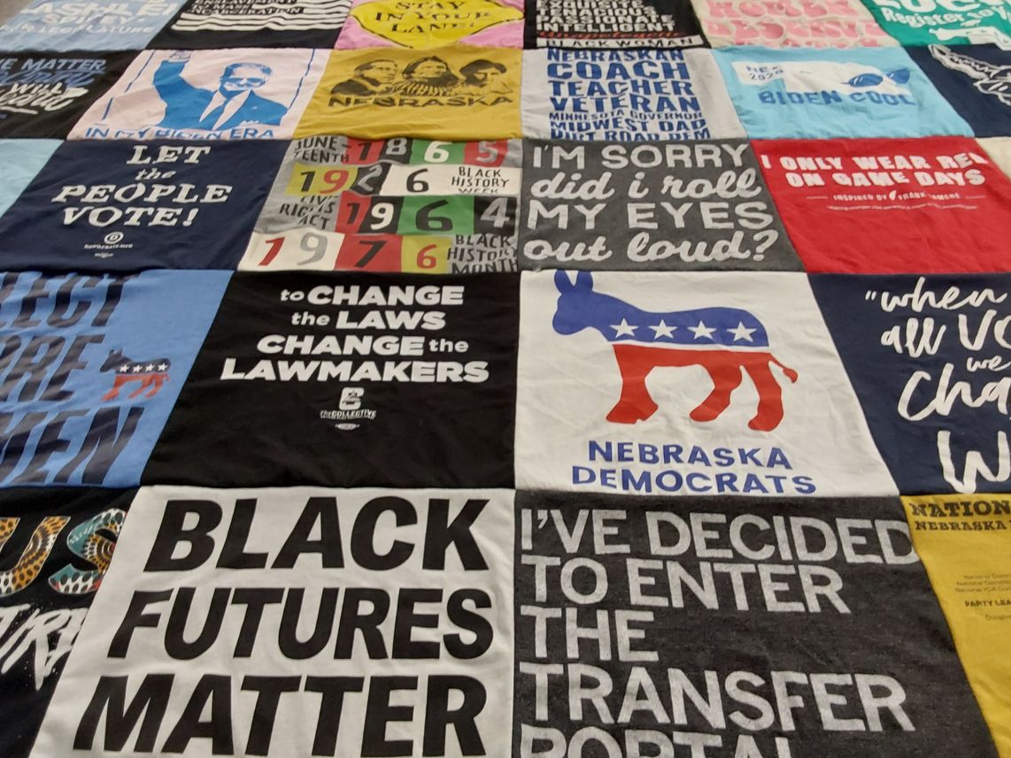 T-shirt quilt with social justice, politics themes by Precious from NE