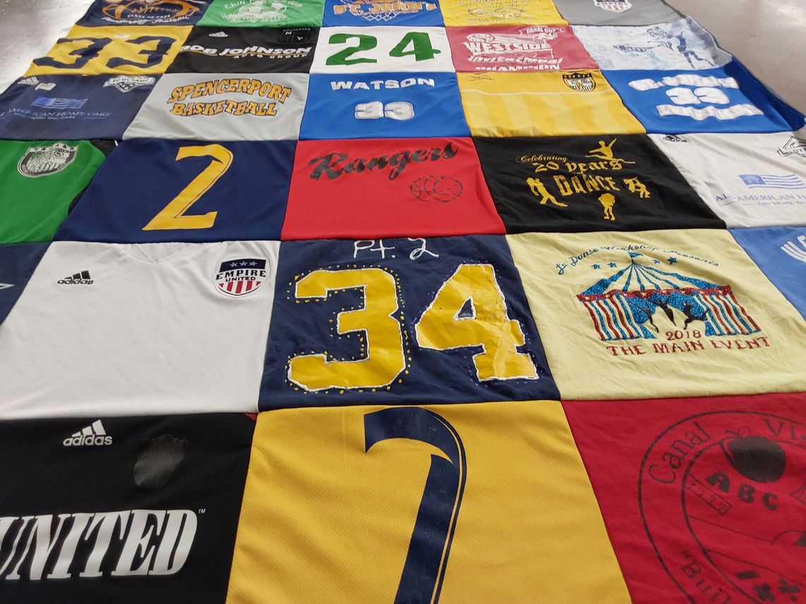T-shirt quilt with sports, dance themes by Lisa from NY