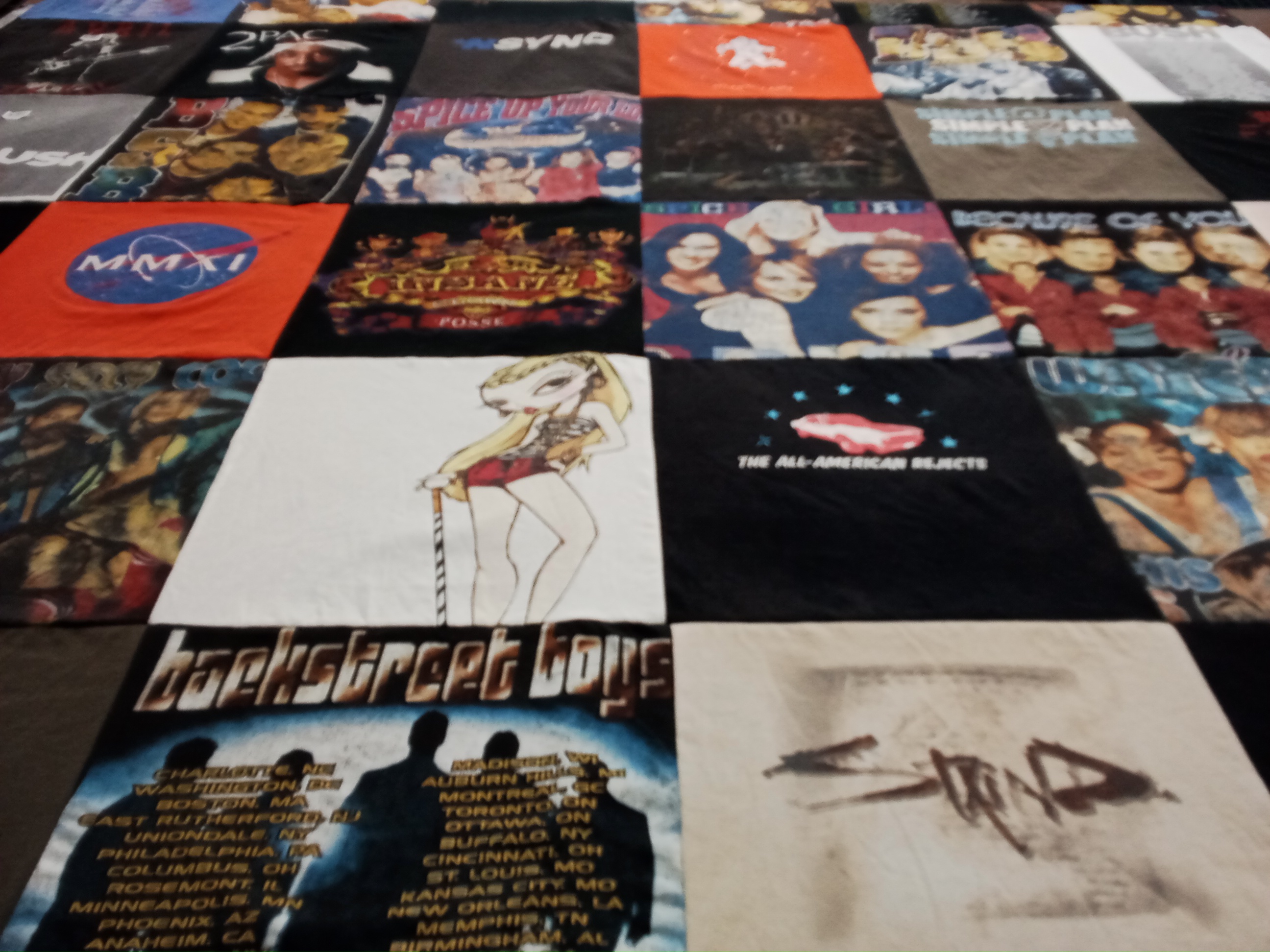 T-shirt quilt with music, pop culture themes by Lauren from GA