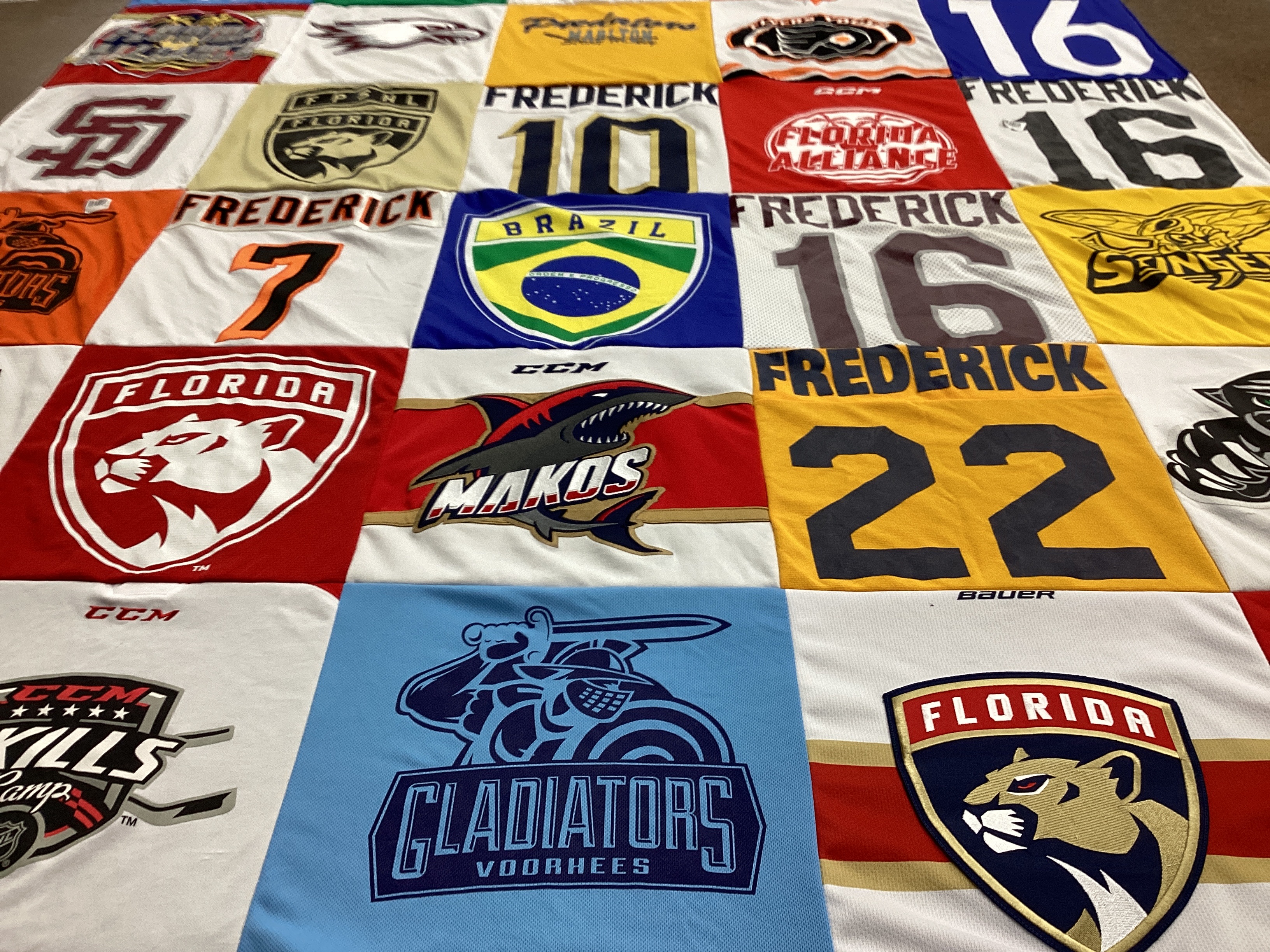 T-shirt quilt with hockey, sports themes by Vanessa from FL