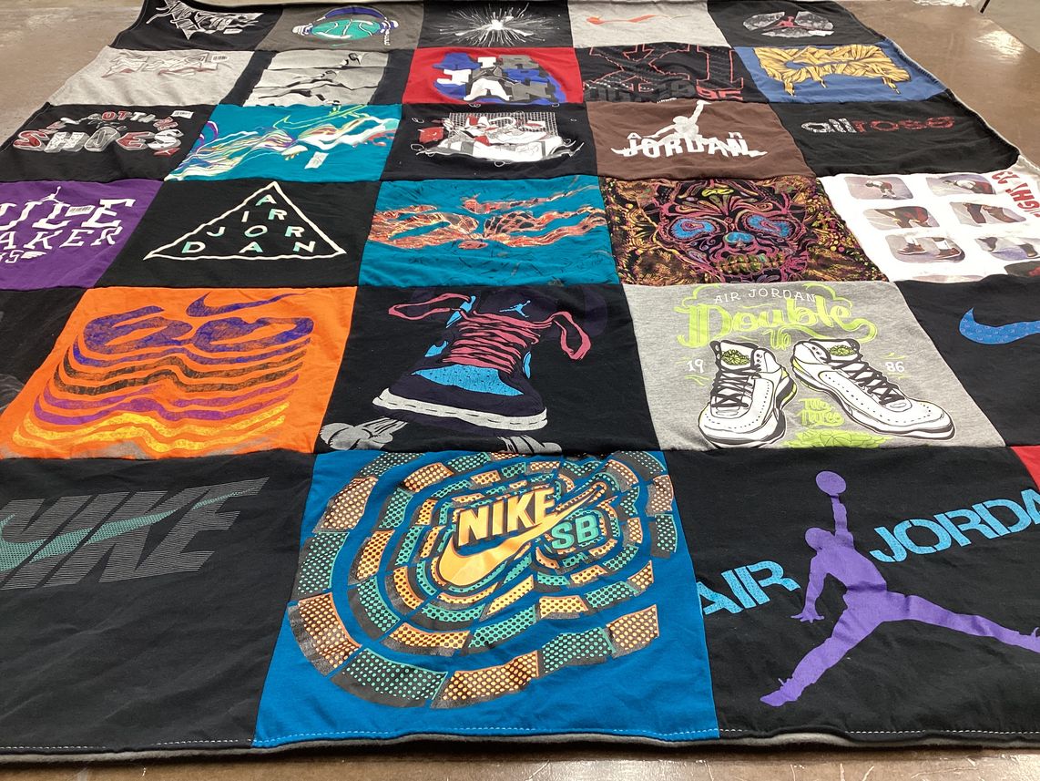 T-shirt quilt with sports, fashion themes by Cheryl from MA
