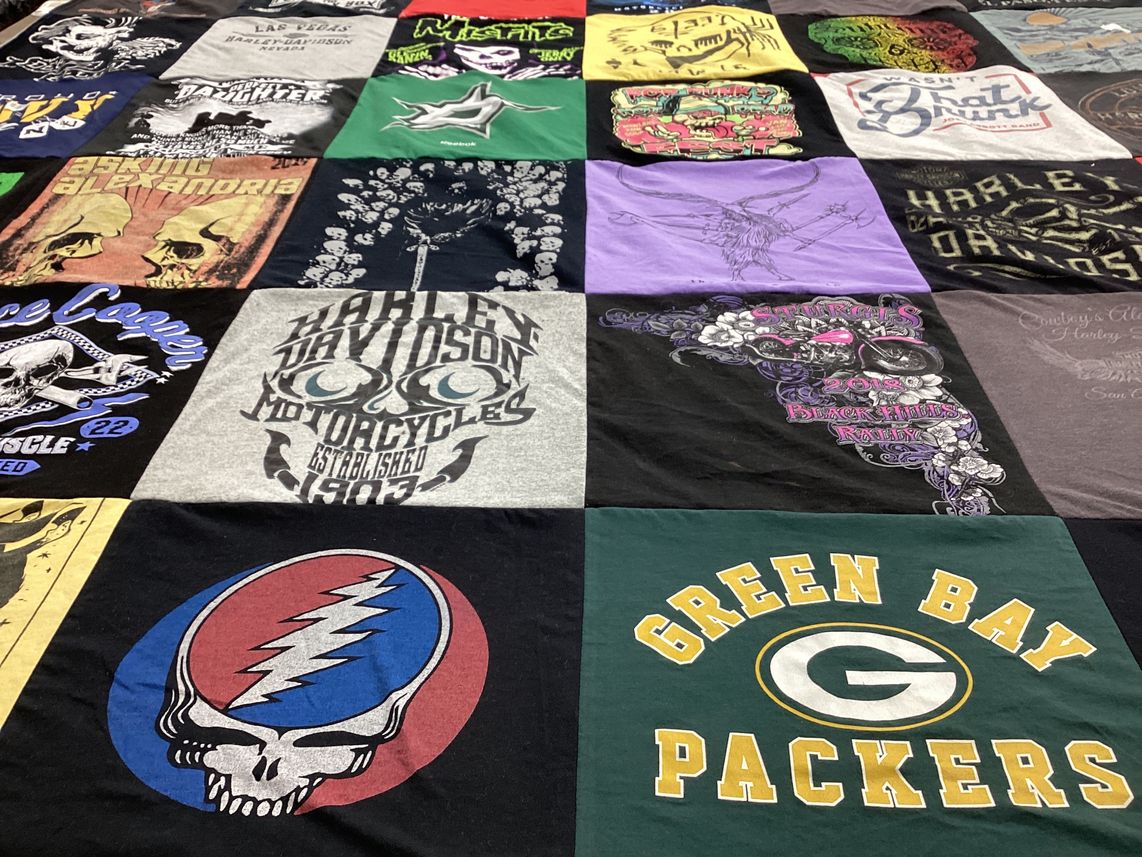 T-shirt quilt with motorcycles, music themes by Larissa from TX