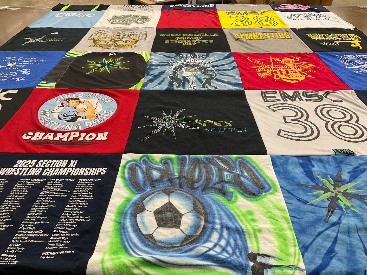 T-shirt quilt with sports, wrestling themes by Melissa from NY