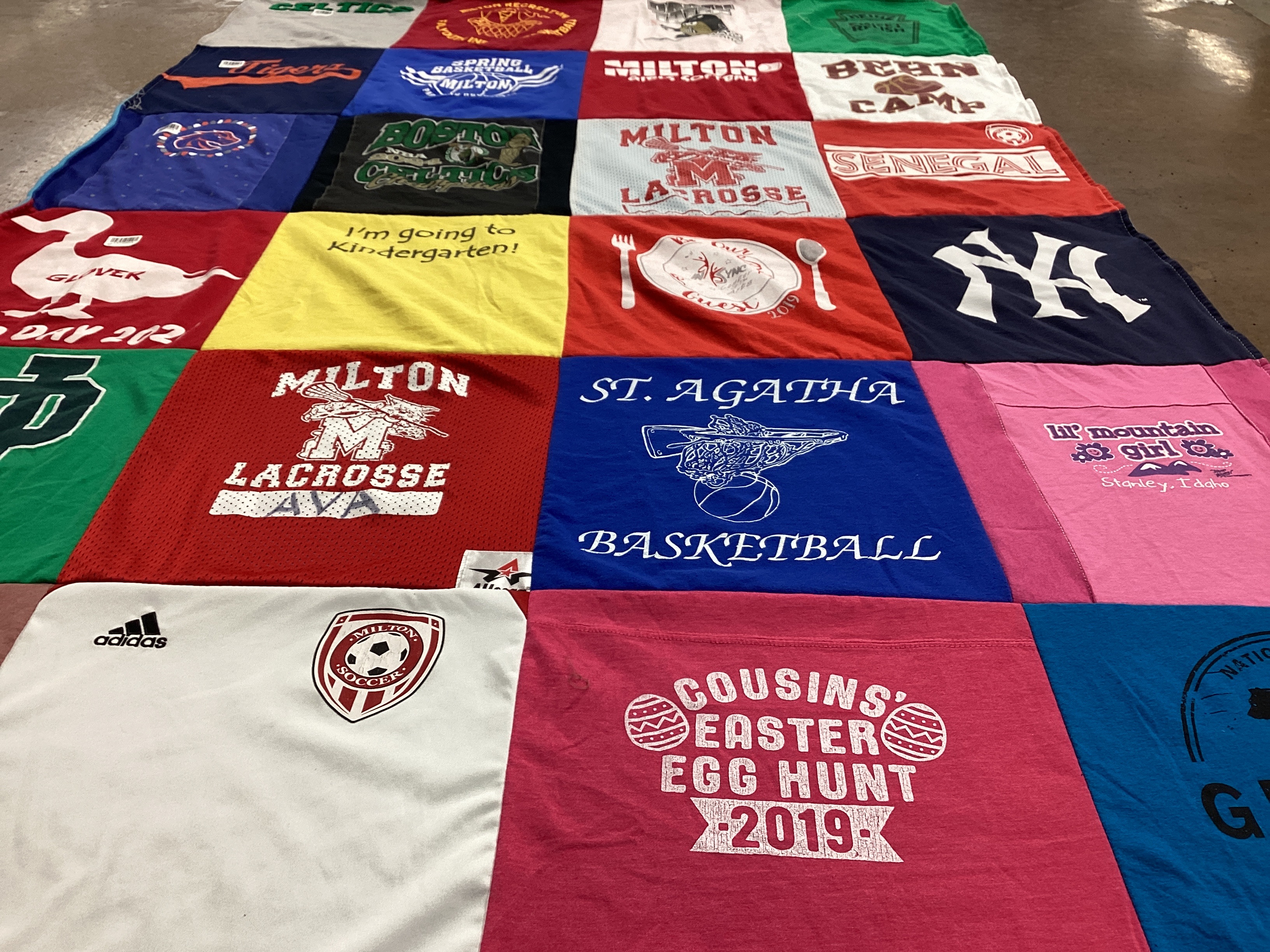 T-shirt quilt featuring milton lacrosse, st agatha basketball by Molly from MA