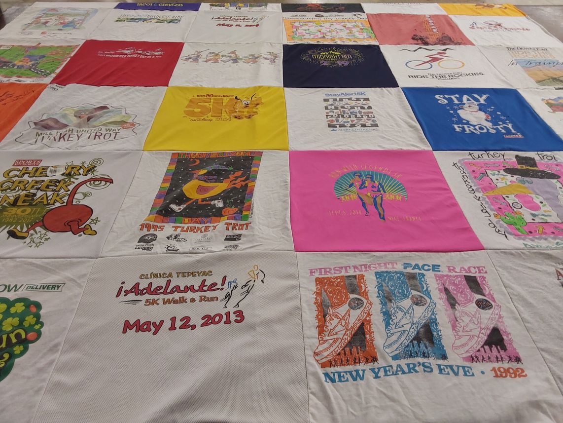 T-shirt quilt with running, walking themes by Nanette from CO