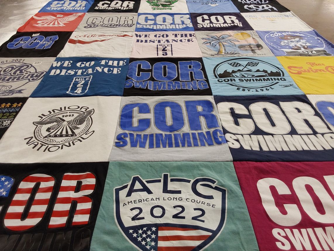 T-shirt quilt with swimming, sports themes by Kevin from TX