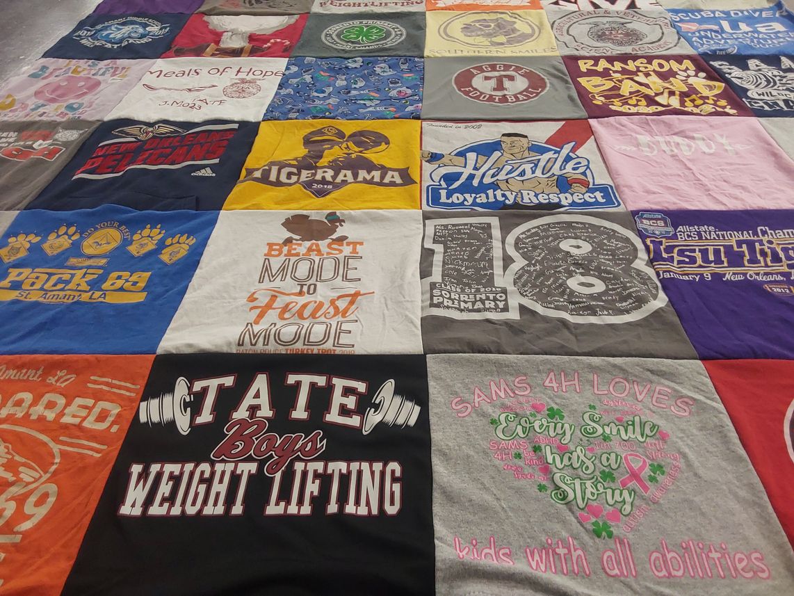 T-shirt quilt featuring louisiana state university tigers, new orleans pelicans by Kristin from FL