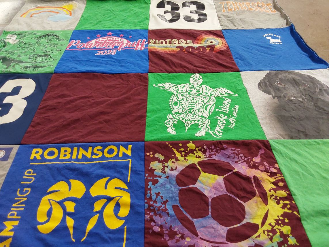 T-shirt quilt featuring sport teams by Heidi from VA