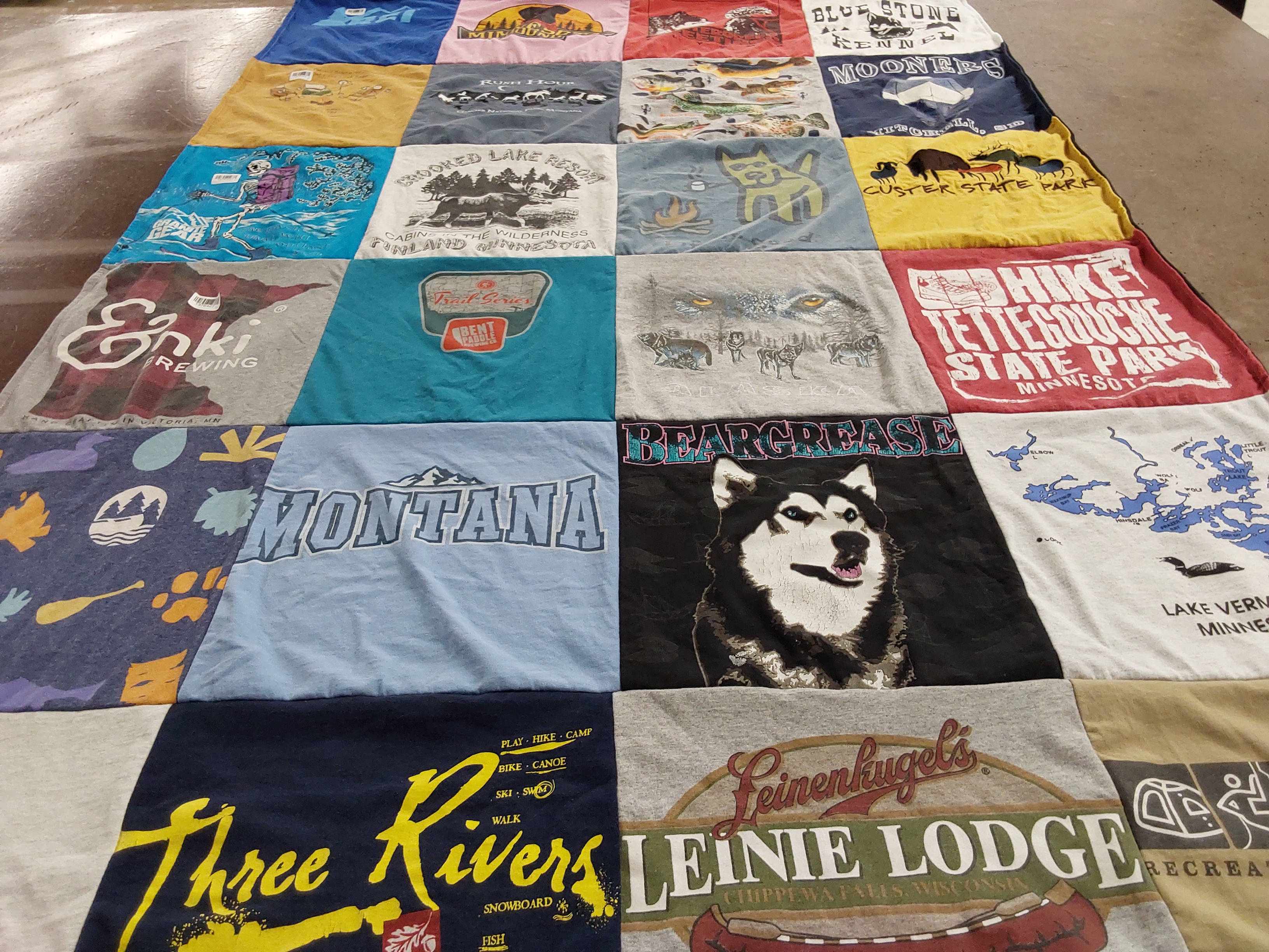 T-shirt quilt with outdoor activities, brewing themes by Deborah from MN