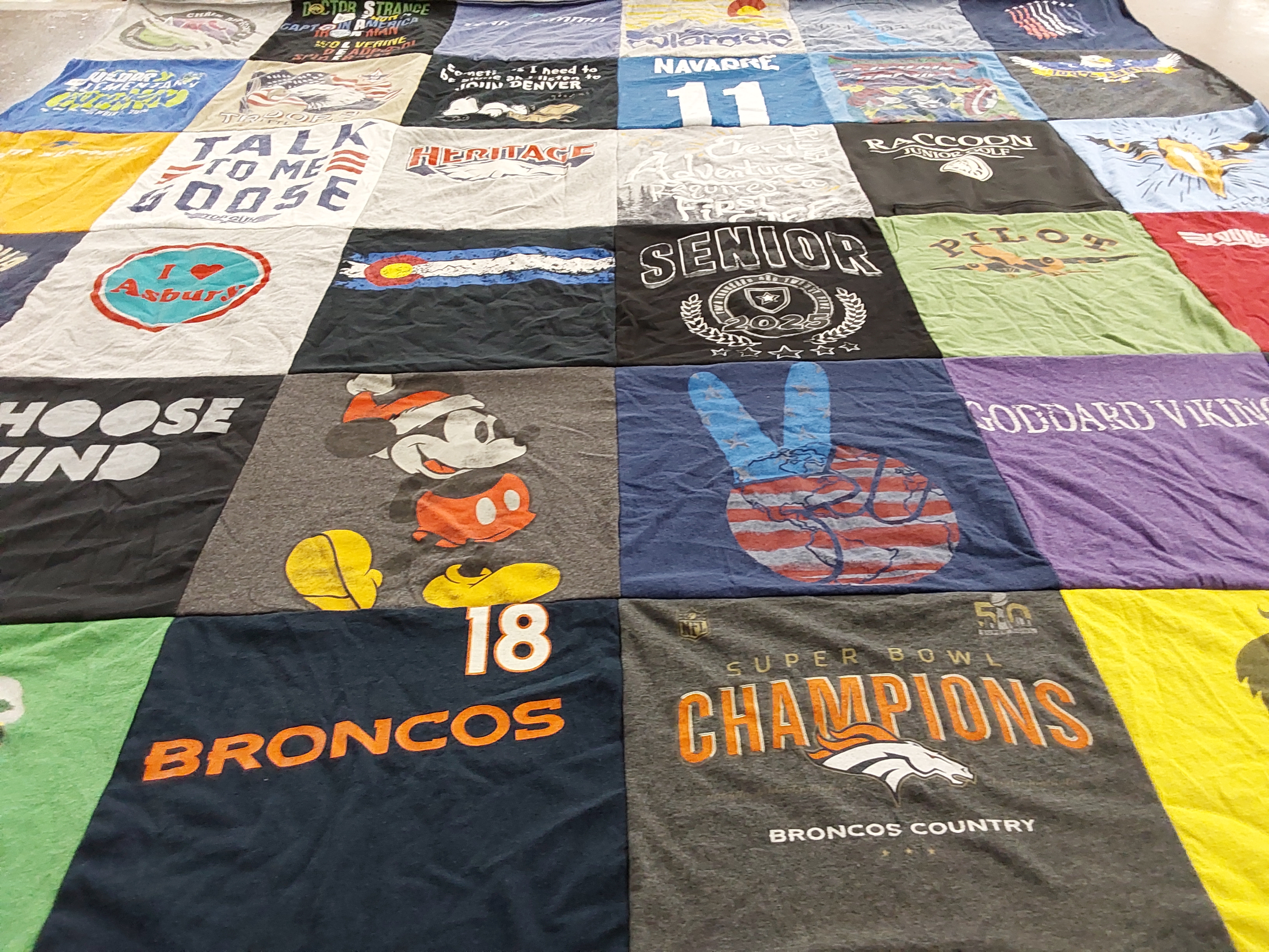 T-shirt quilt featuring denver broncos, goddard viking by Laura from CO