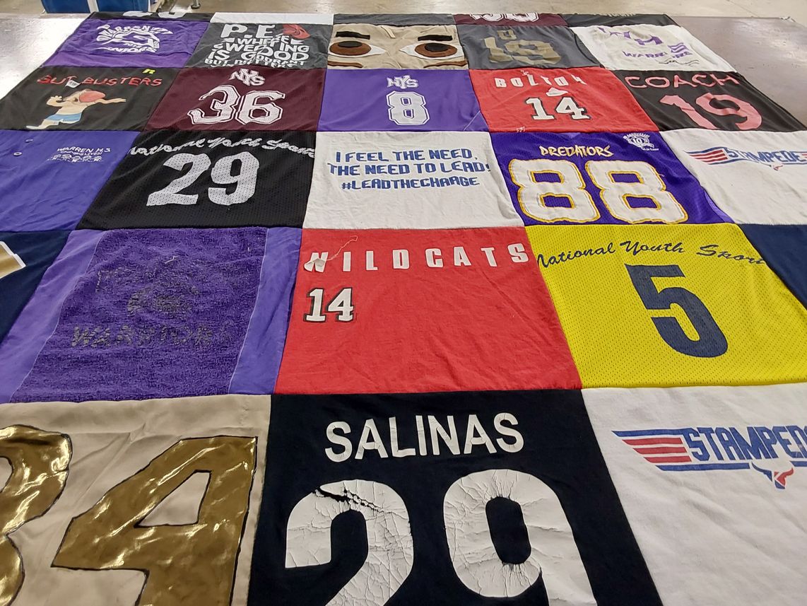 T-shirt quilt with sports, youth programs themes by Ramiro from TX