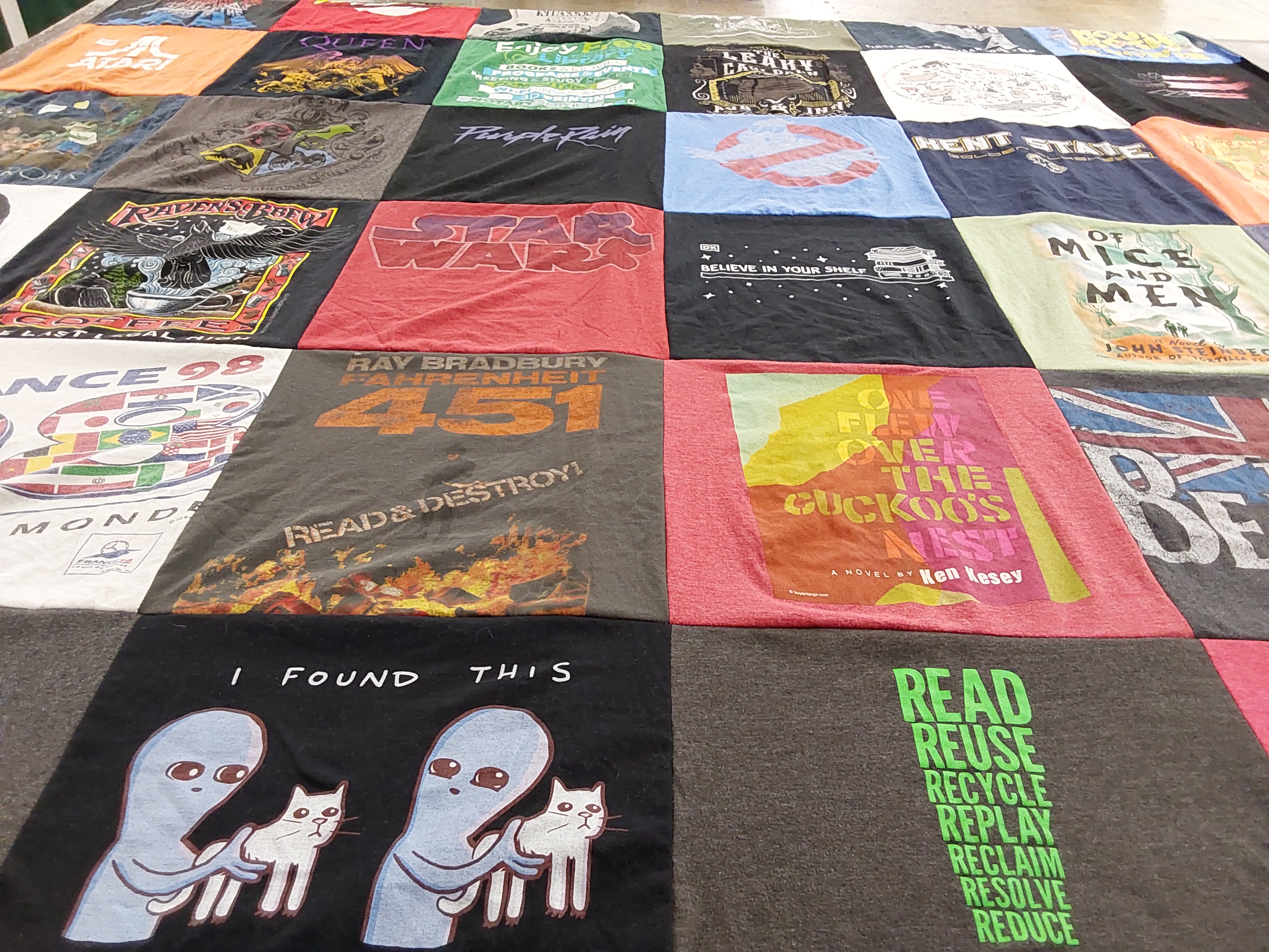 T-shirt quilt with literature, music themes by Julie from OH