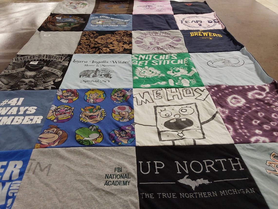 T-shirt quilt with gaming, motorcycles themes by Amber from WI