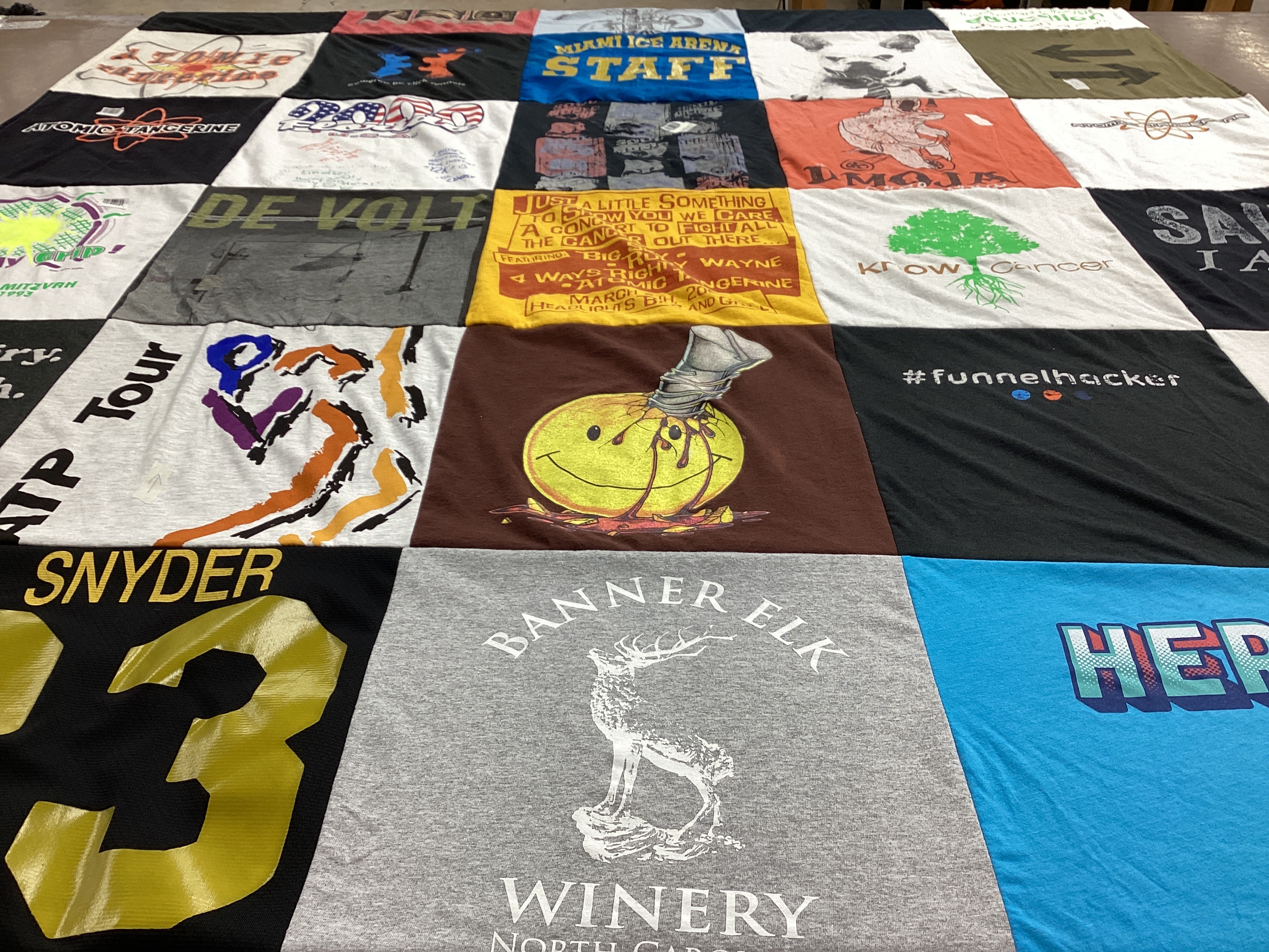 T-shirt quilt with cancer awareness, music themes by Debra from FL