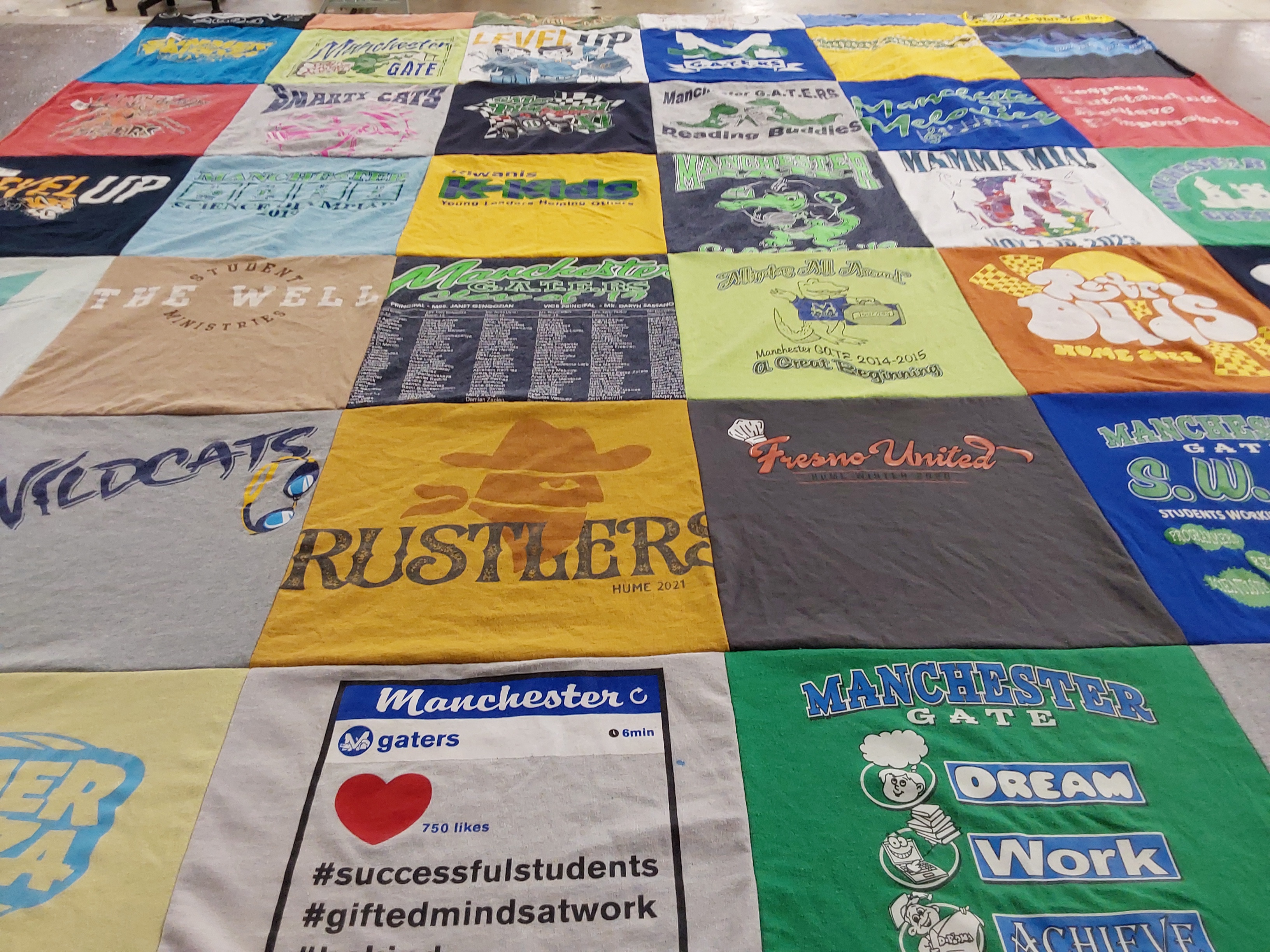 T-shirt quilt featuring wildcats team, rustlers team by Catherine from CA