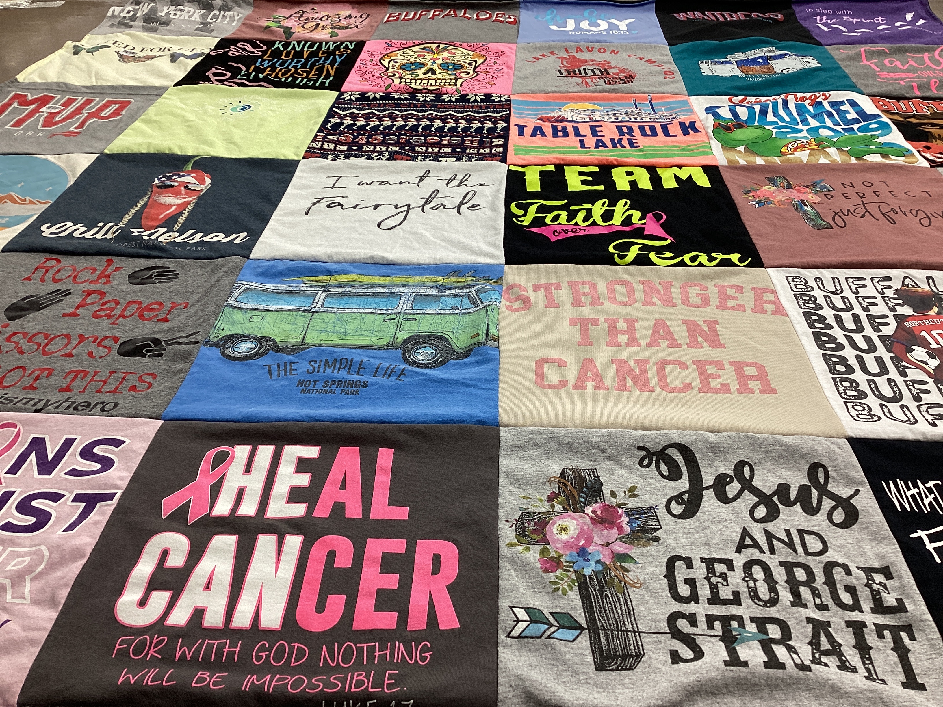T-shirt quilt with travel, music themes by Nancy from TX