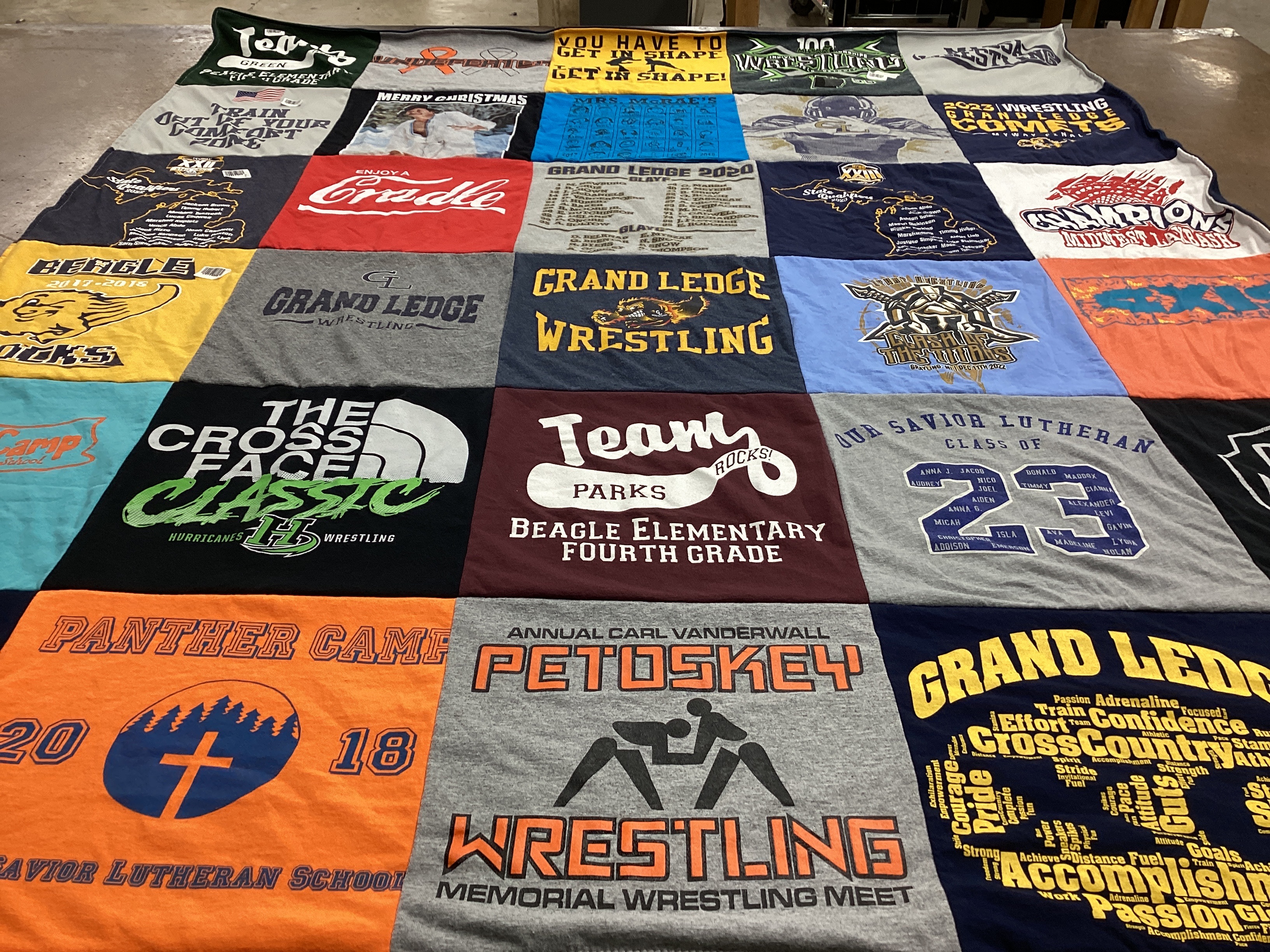 T-shirt quilt featuring grand ledge wrestling, hurricanes wrestling by erin from MI