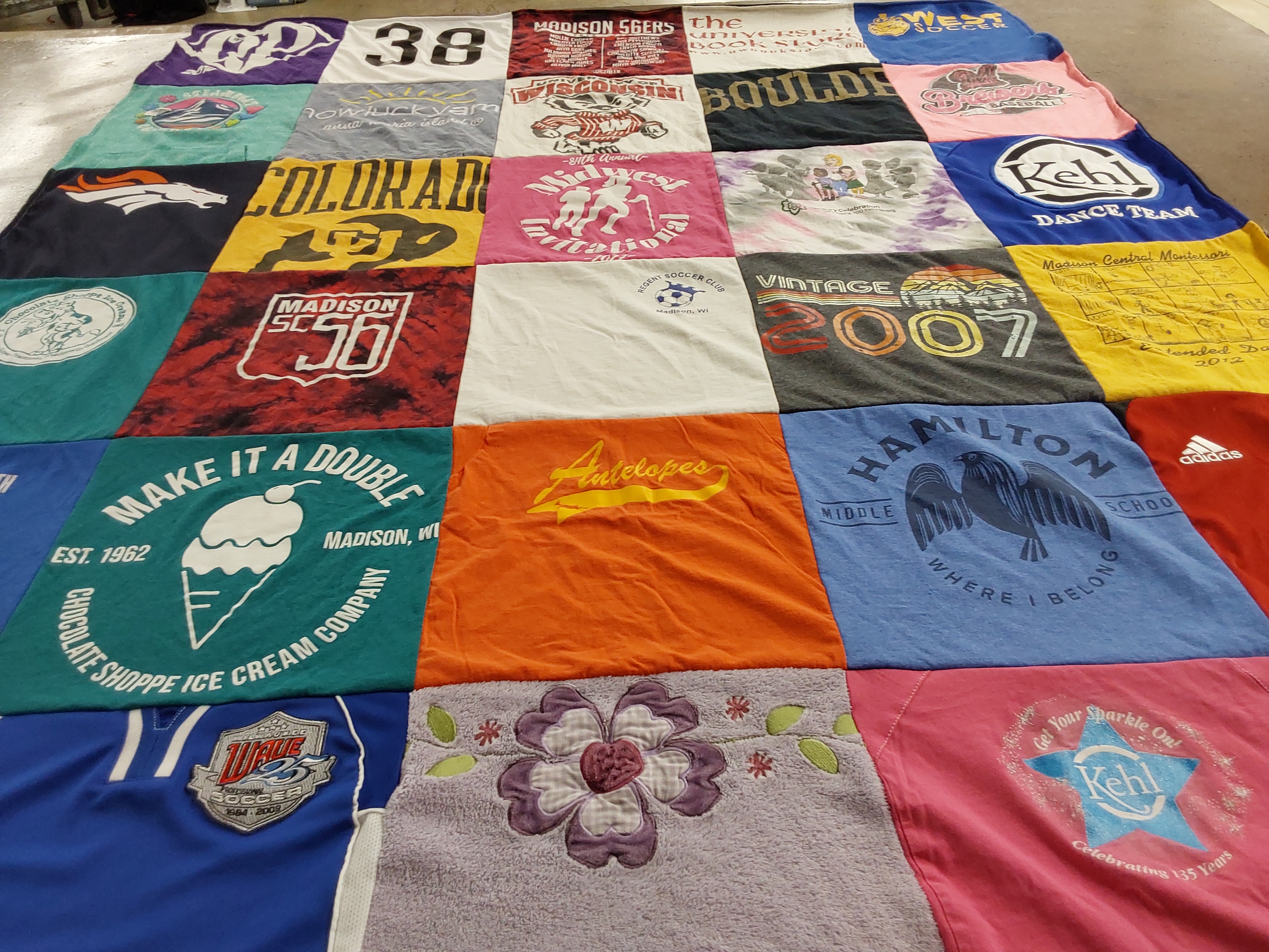 T-shirt quilt featuring wave soccer team by Abby from WI