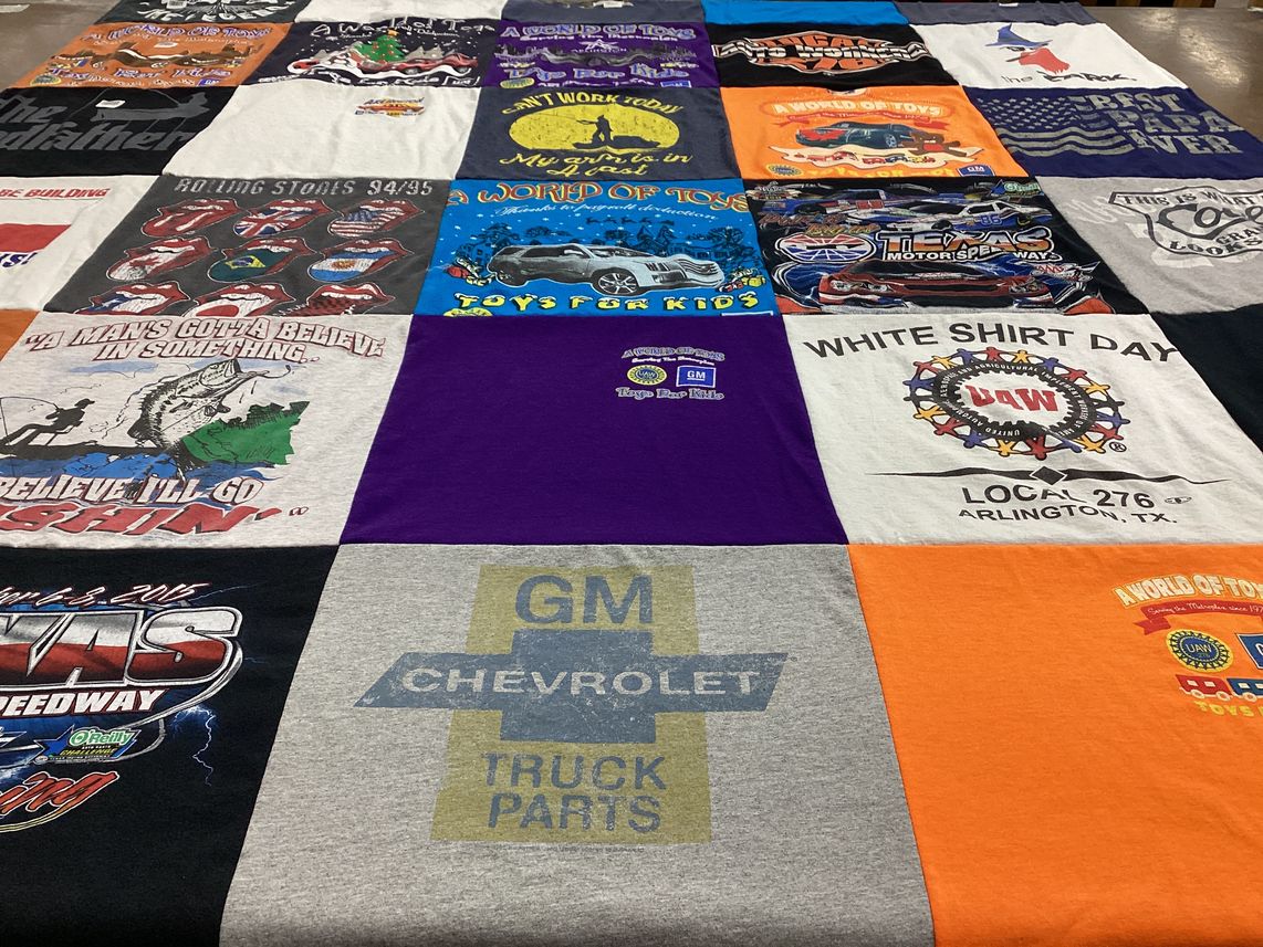 T-shirt quilt with fishing, motorsport themes by Karen from TX