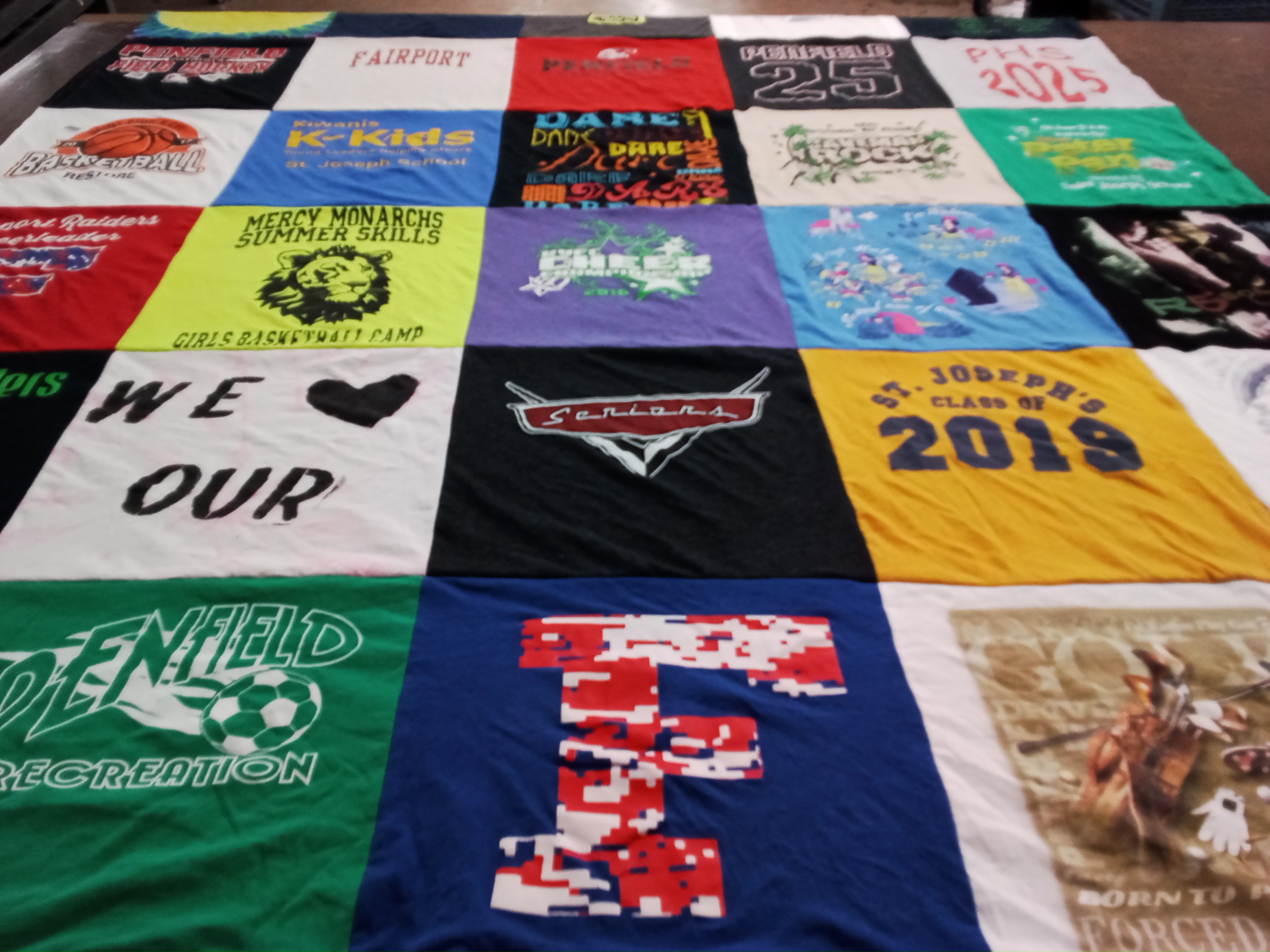 T-shirt quilt featuring mercy monarchs, fairport raiders by Lisa from NY