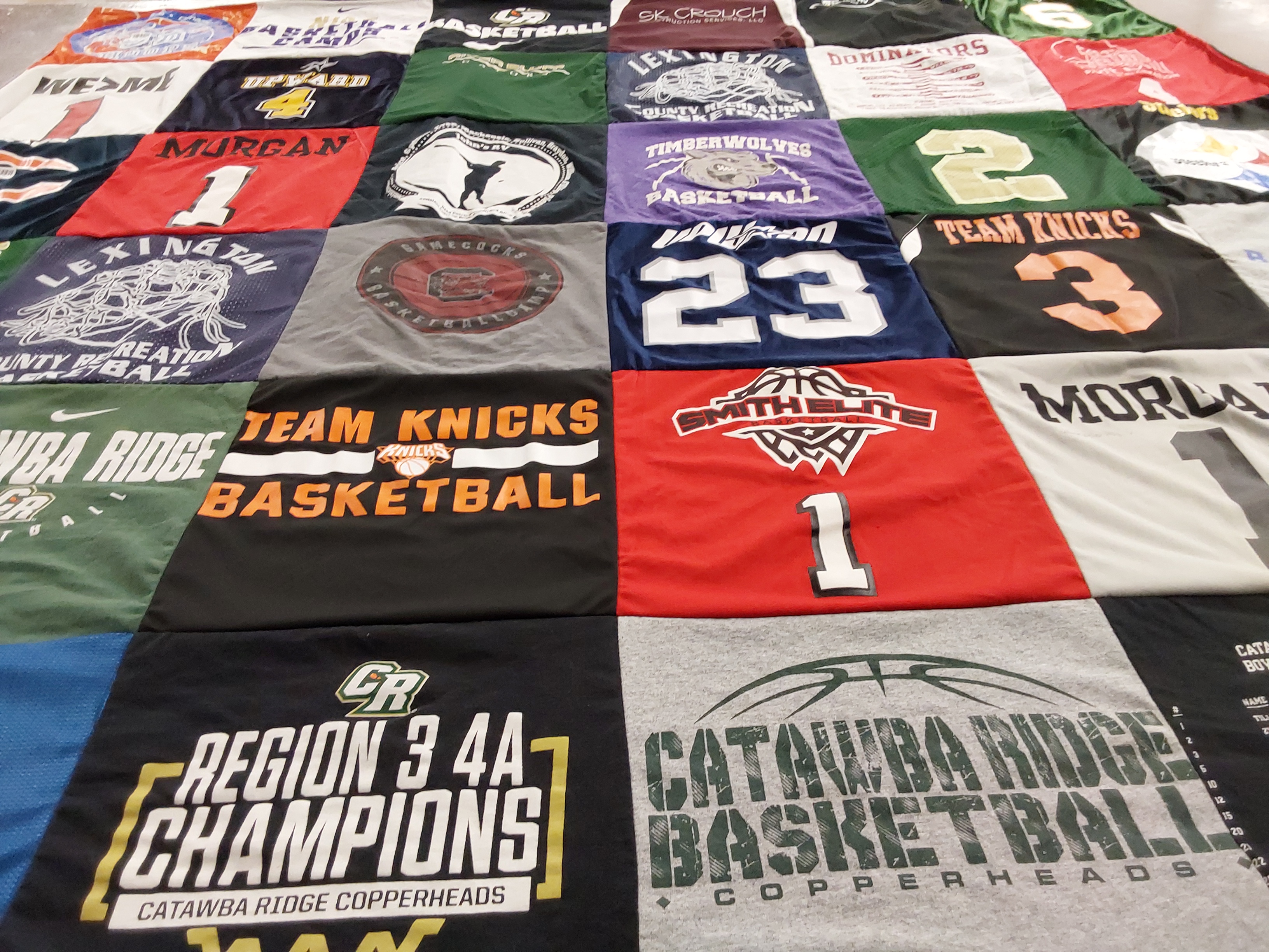 T-shirt quilt featuring team knicks, timberwolves basketball by Alison from SC