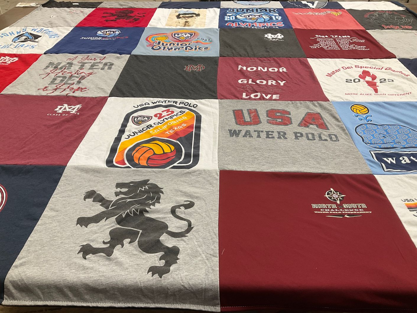 T-shirt quilt with water polo, sports themes by Thalia from CA