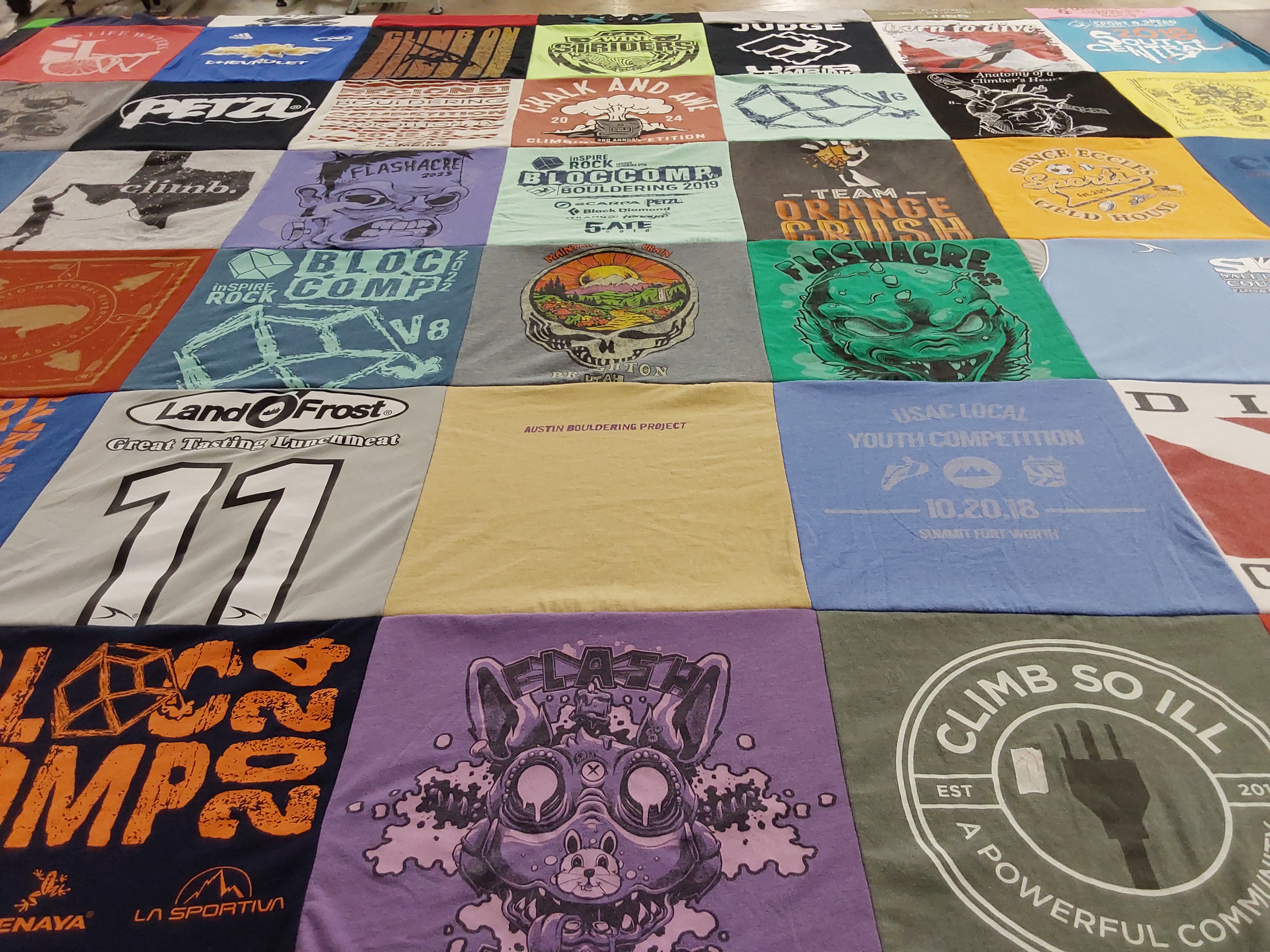 T-shirt quilt with climbing, bouldering themes by Chelsey from TX