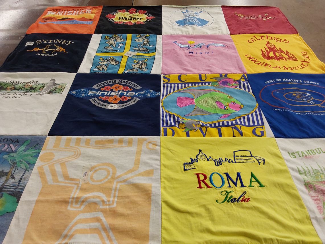 T-shirt quilt with running, travel themes by Richard from HI