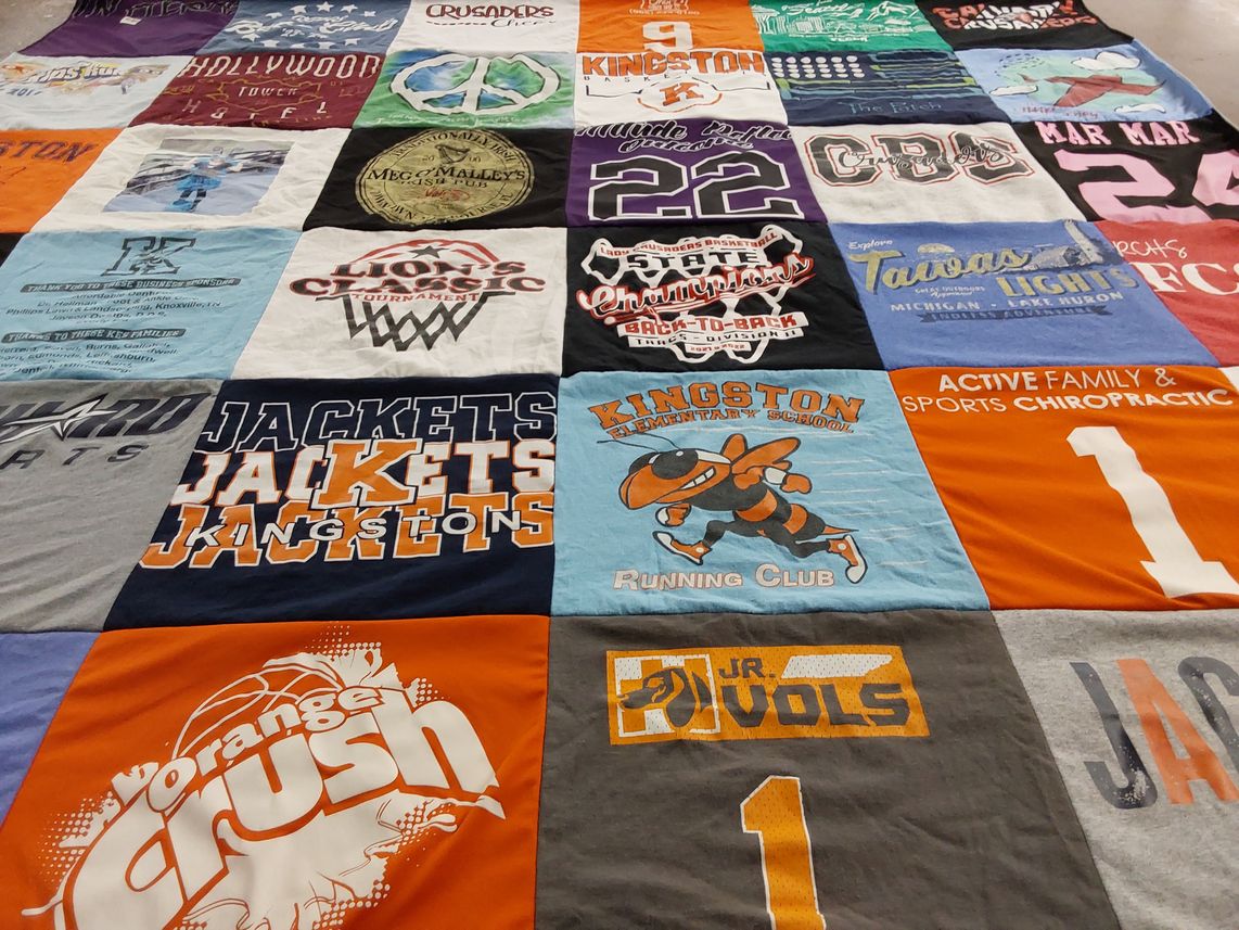 T-shirt quilt featuring jackets by maura from TN