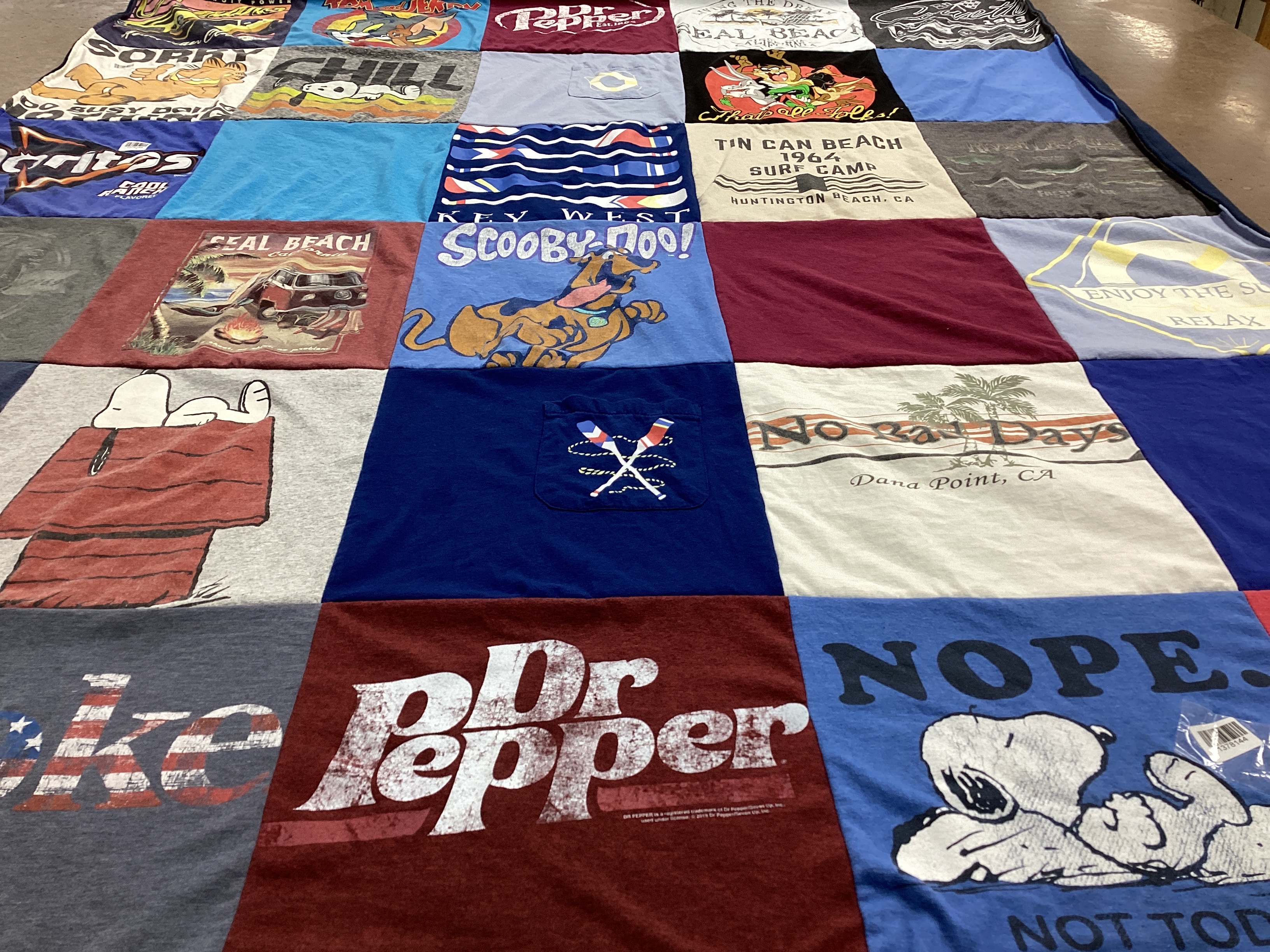 T-shirt quilt with beach, surfing themes by Susan from CA
