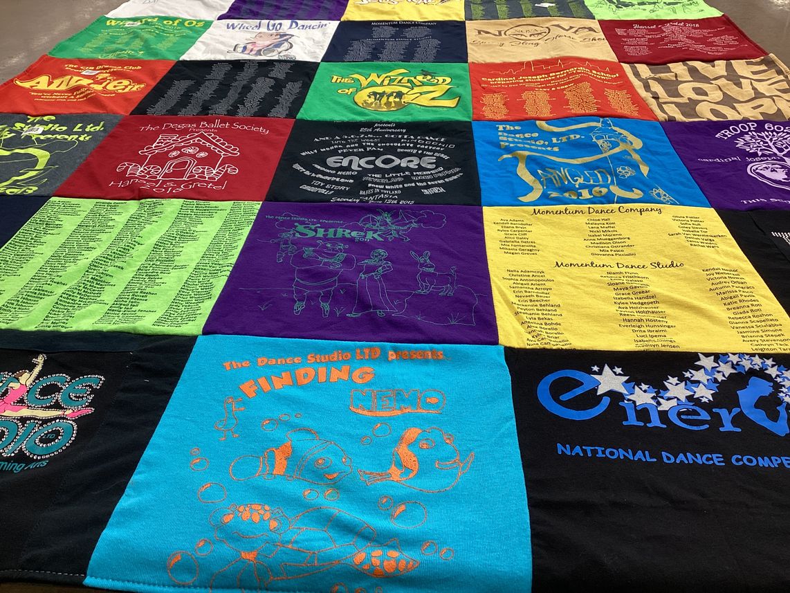 T-shirt quilt with dance, theater themes by Edna from IL