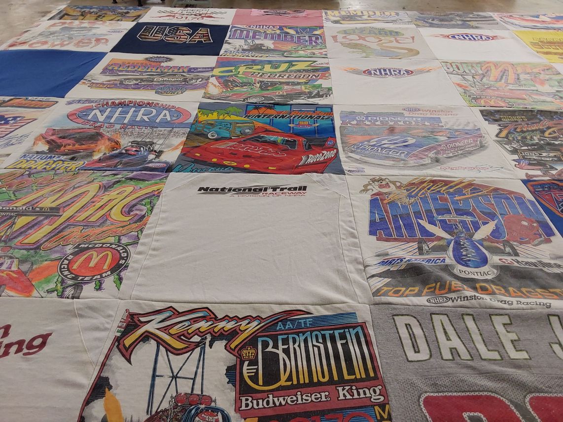 T-shirt quilt with drag racing, auto racing themes by Mary Ann from OH