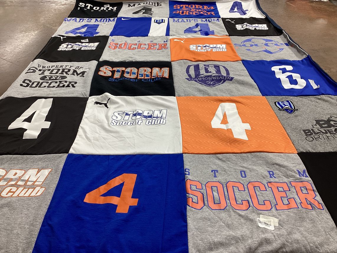 T-shirt quilt with soccer themes by Michele from KY