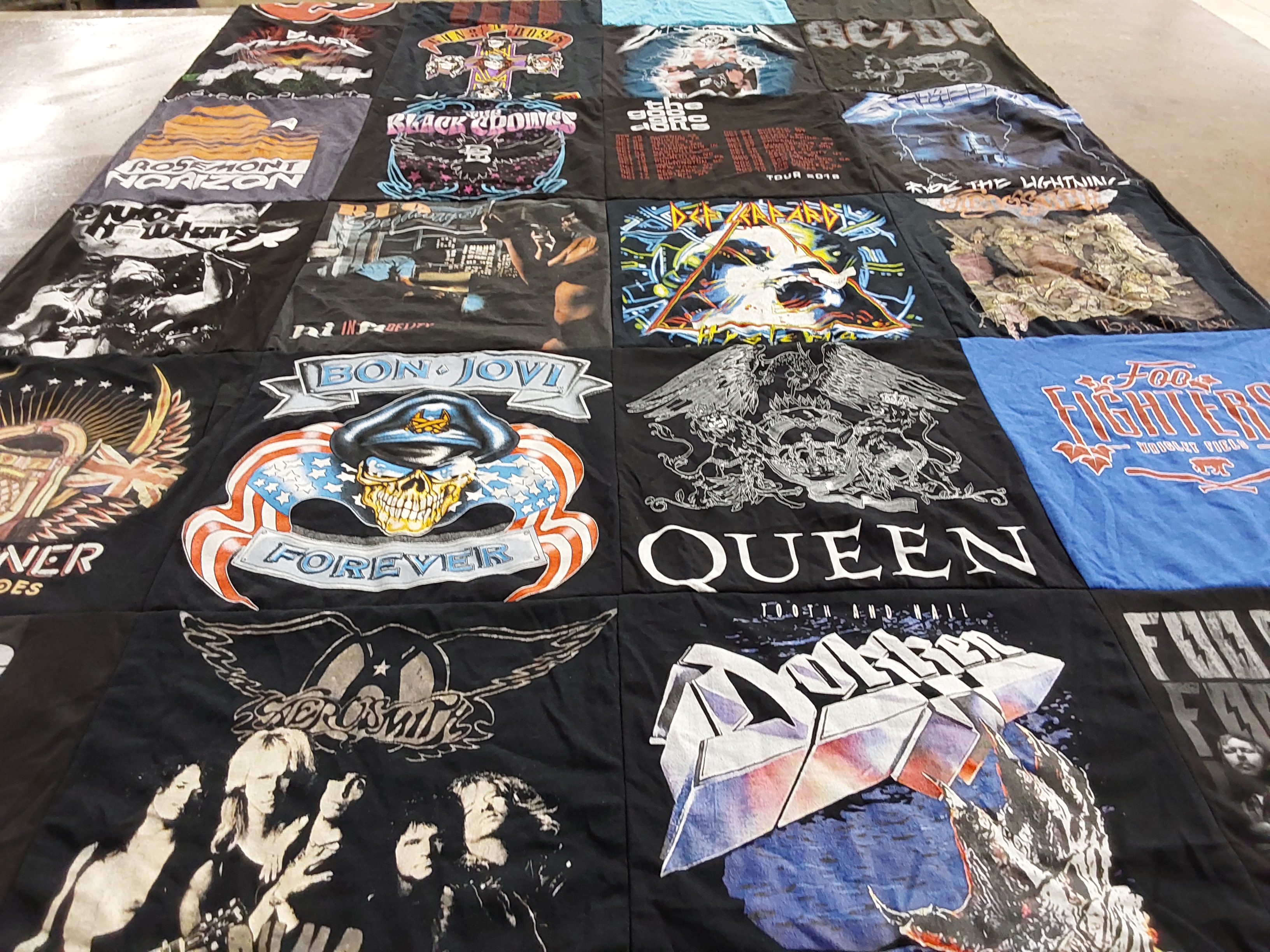 T-shirt quilt with rock, music themes by GINA from IL
