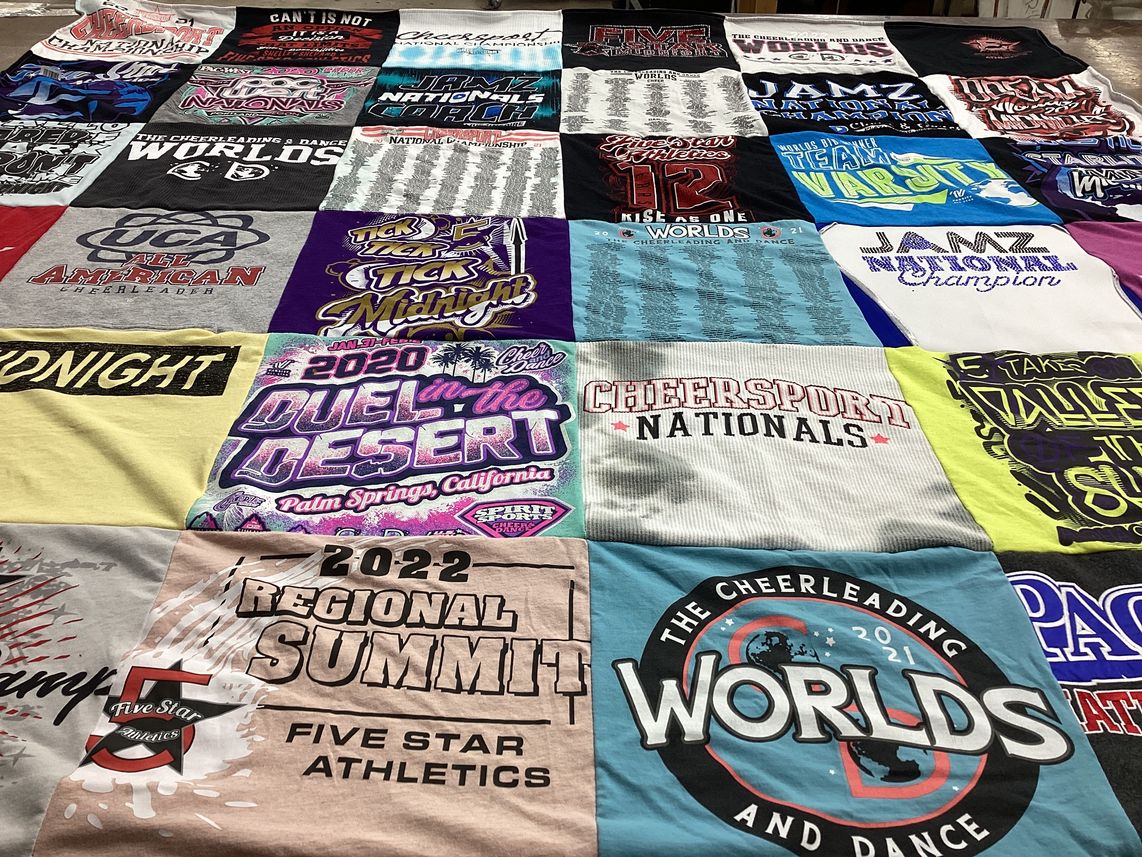 T-shirt quilt with cheerleading, dance themes by Kinzee from NV