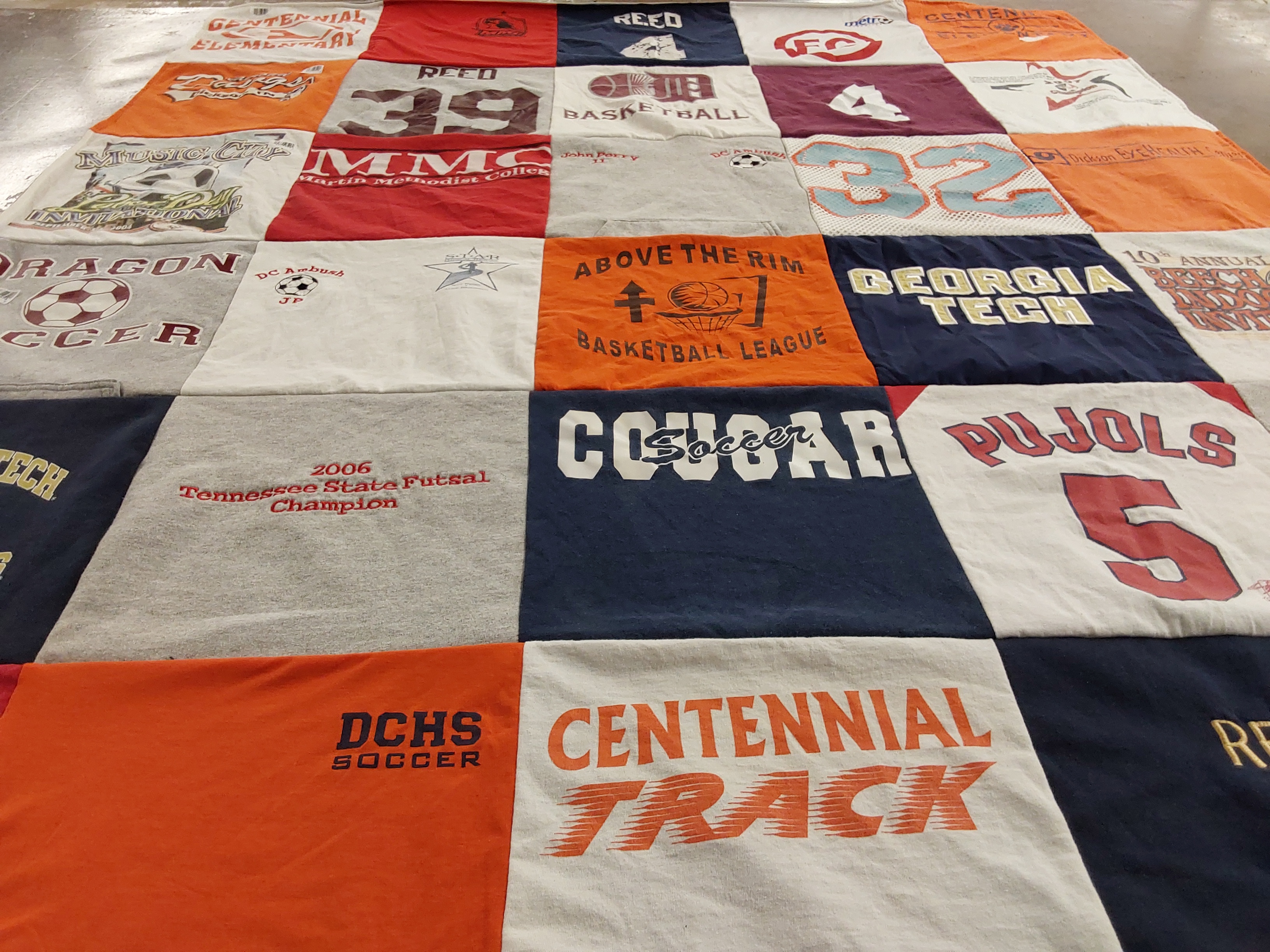 T-shirt quilt featuring dchs soccer, centennial track by Mary from TN