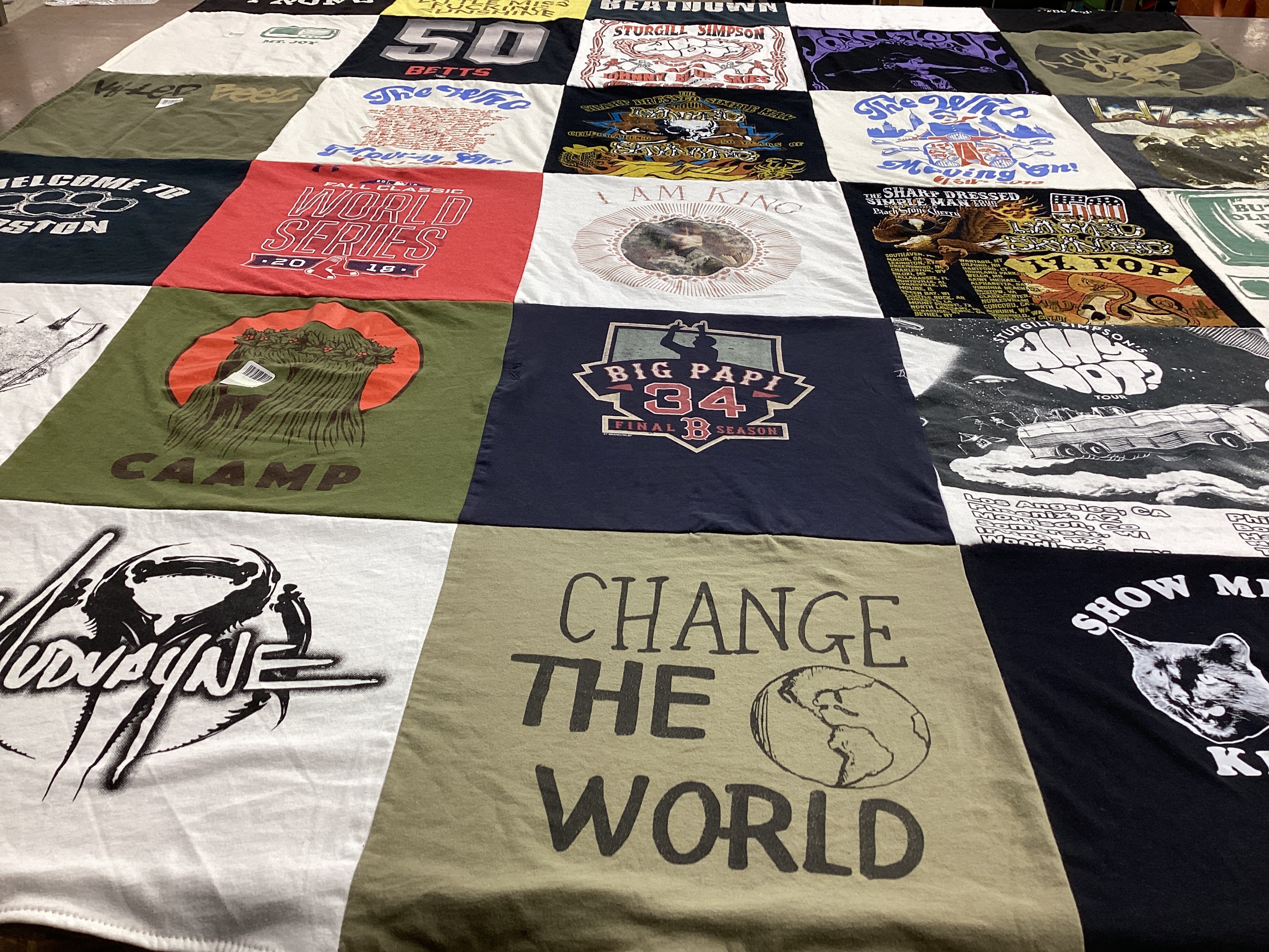 T-shirt quilt with music, sports themes by Julie from MA