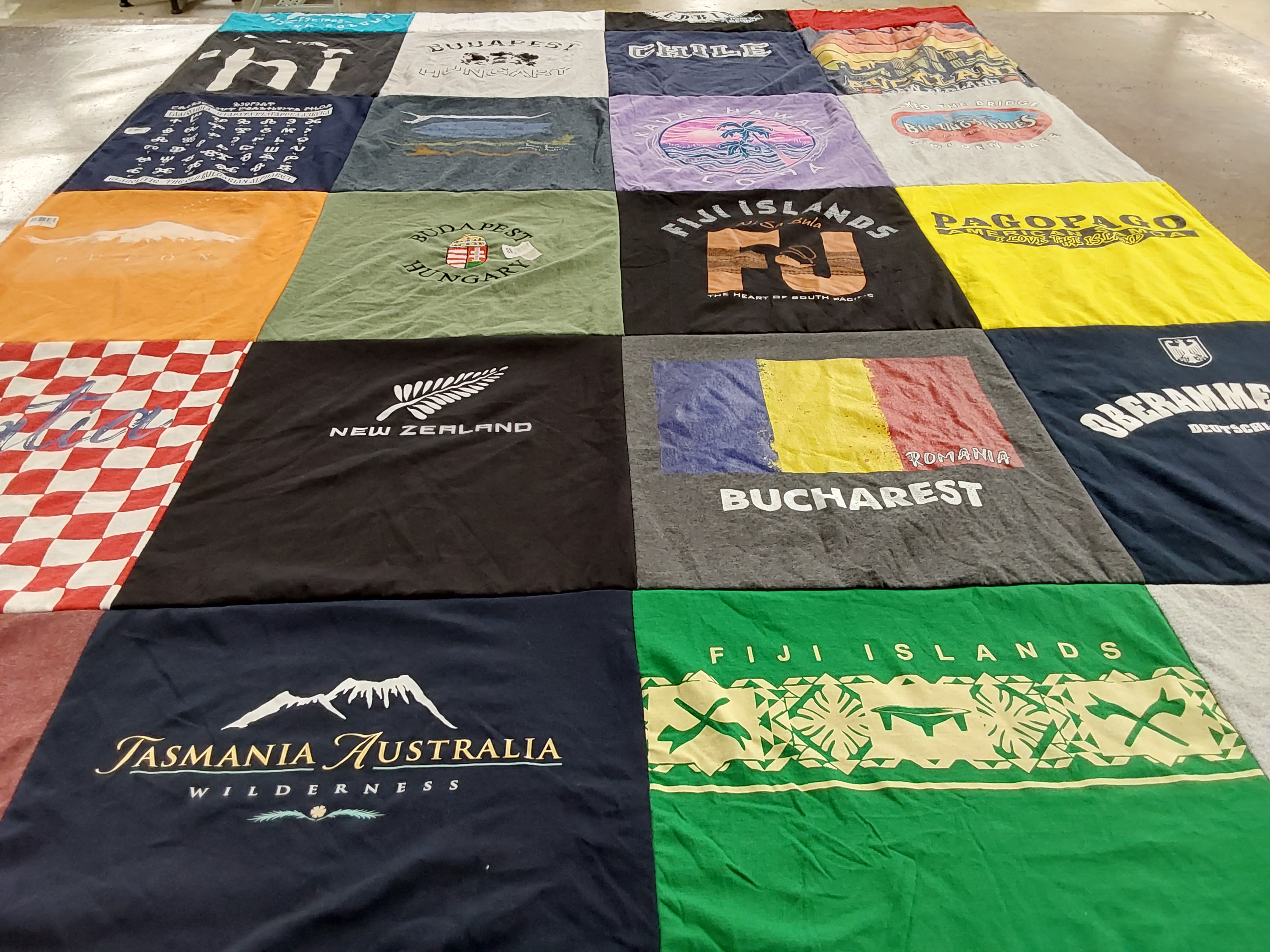 T-shirt quilt with travel, geography themes by Gene from GA